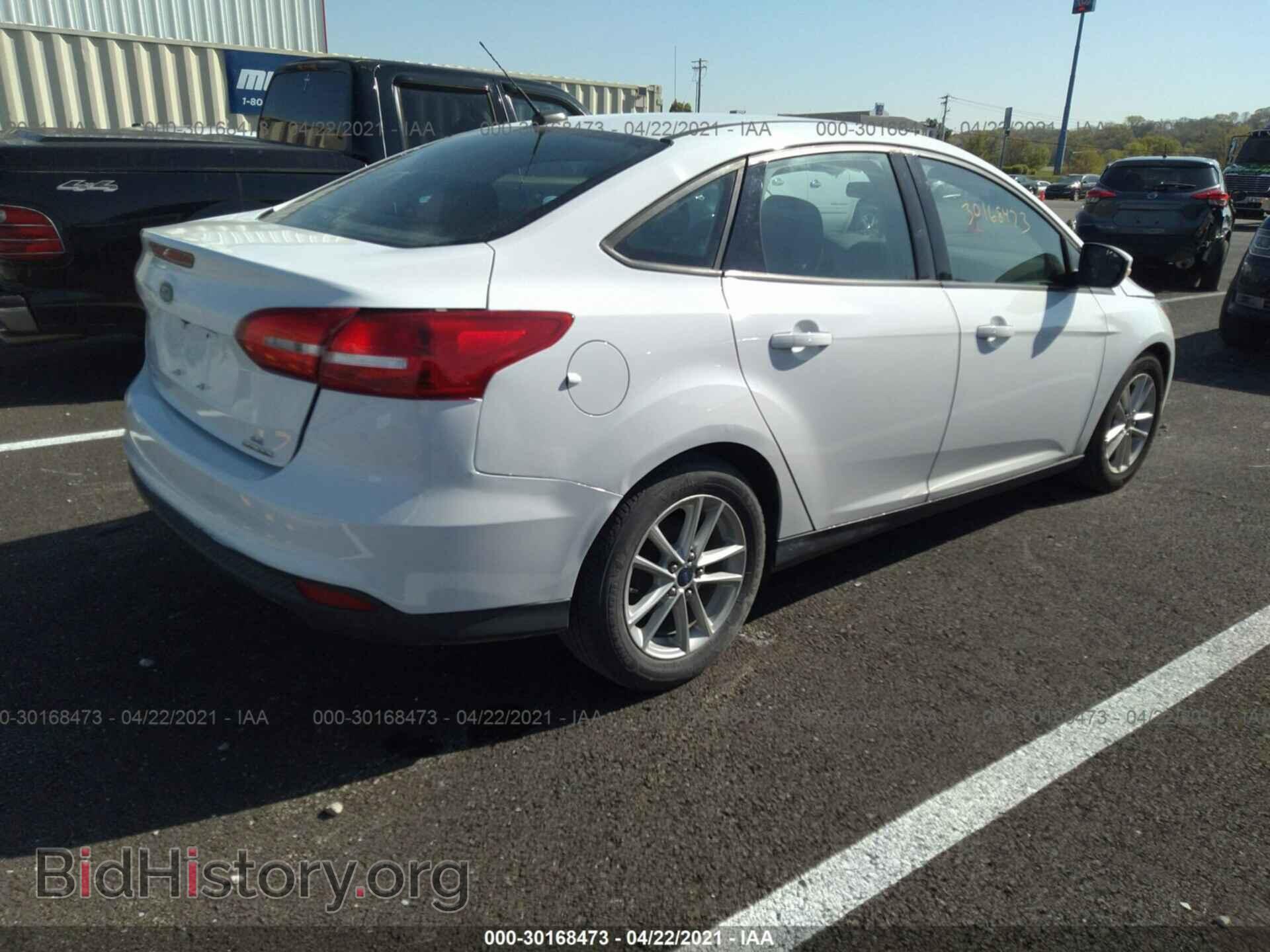 2015 FORD FOCUS - VIN: 1FADP3F23FL250059 - Photo 4