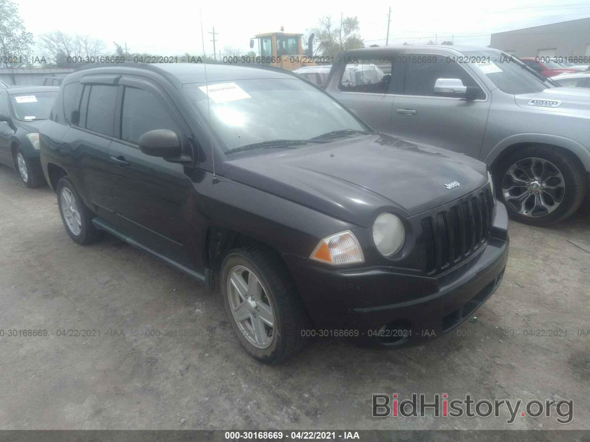 Photo 1J4NF4FB0AD611574 - JEEP COMPASS 2010