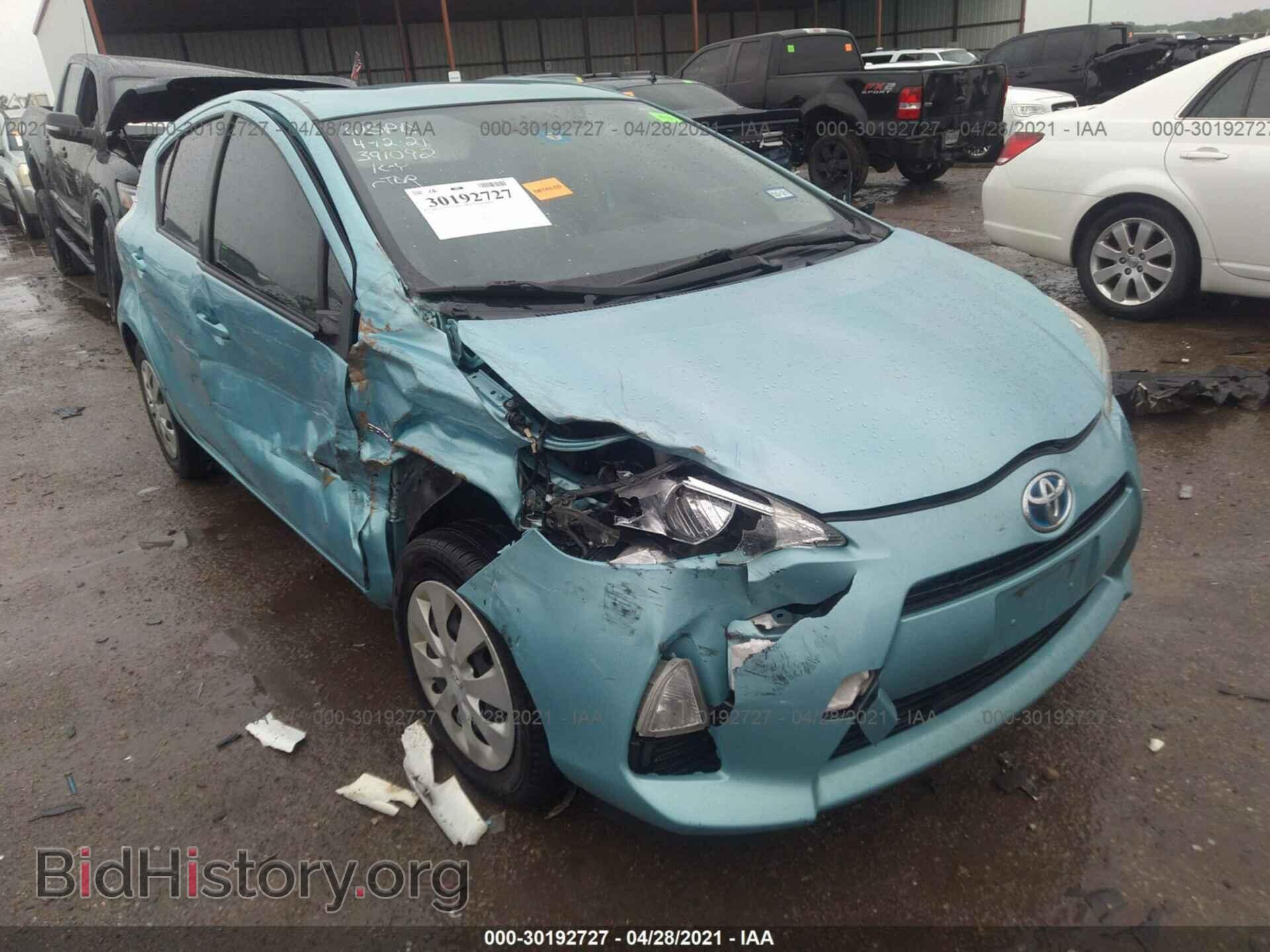 Фотография JTDKDTB37E1067038 - TOYOTA PRIUS C 2014