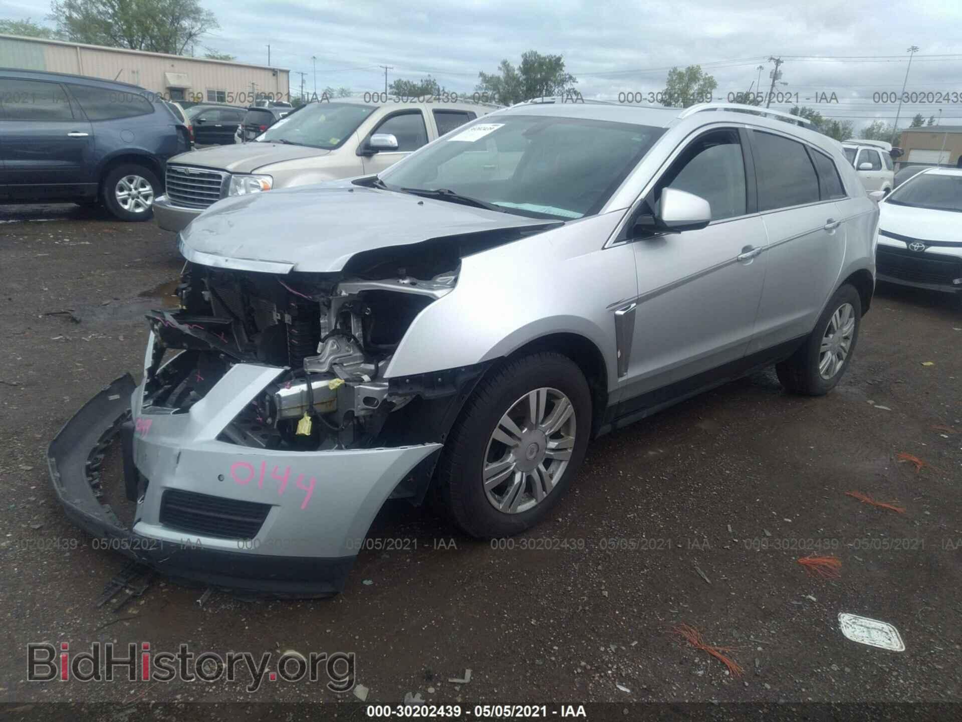 2013 CADILLAC SRX - VIN: 3GYFNCE30DS546113 - Фото 2
