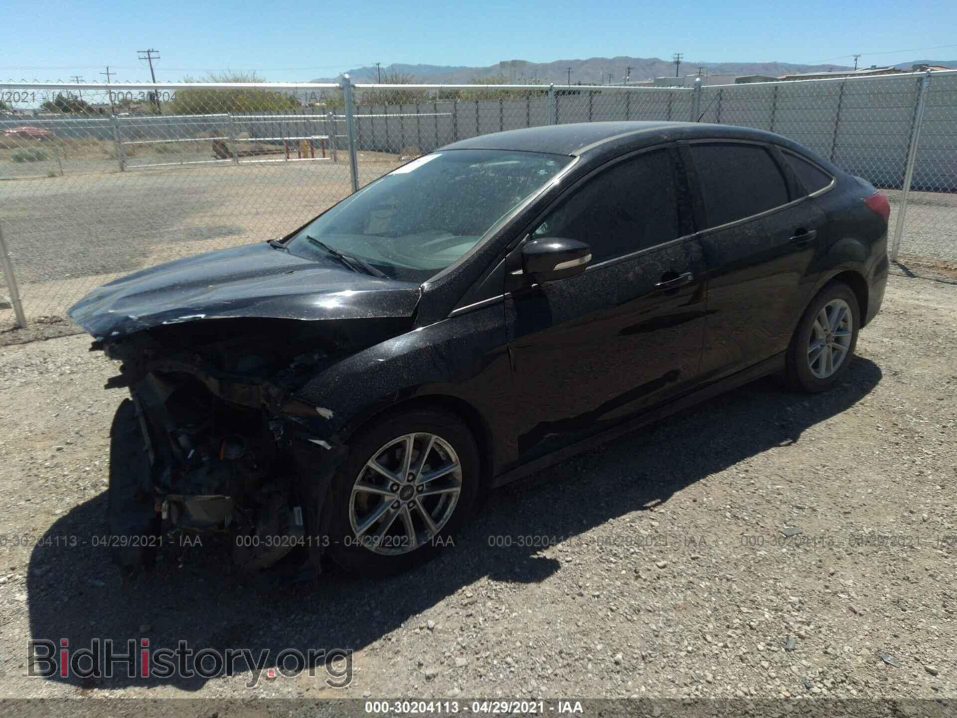 2017 FORD FOCUS - VIN: 1FADP3F24HL231619 - Фото 2
