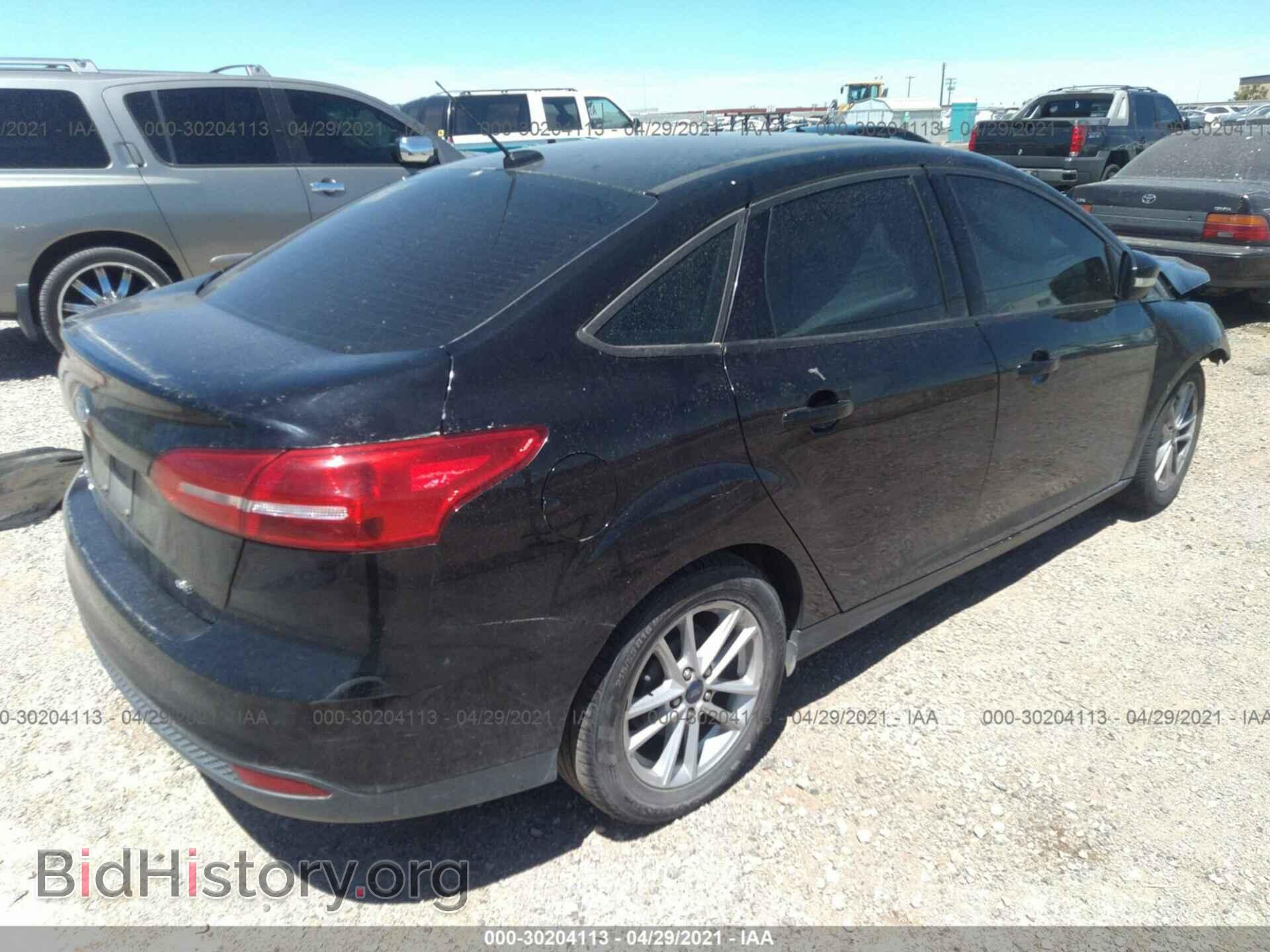 2017 FORD FOCUS - VIN: 1FADP3F24HL231619 - Фото 4