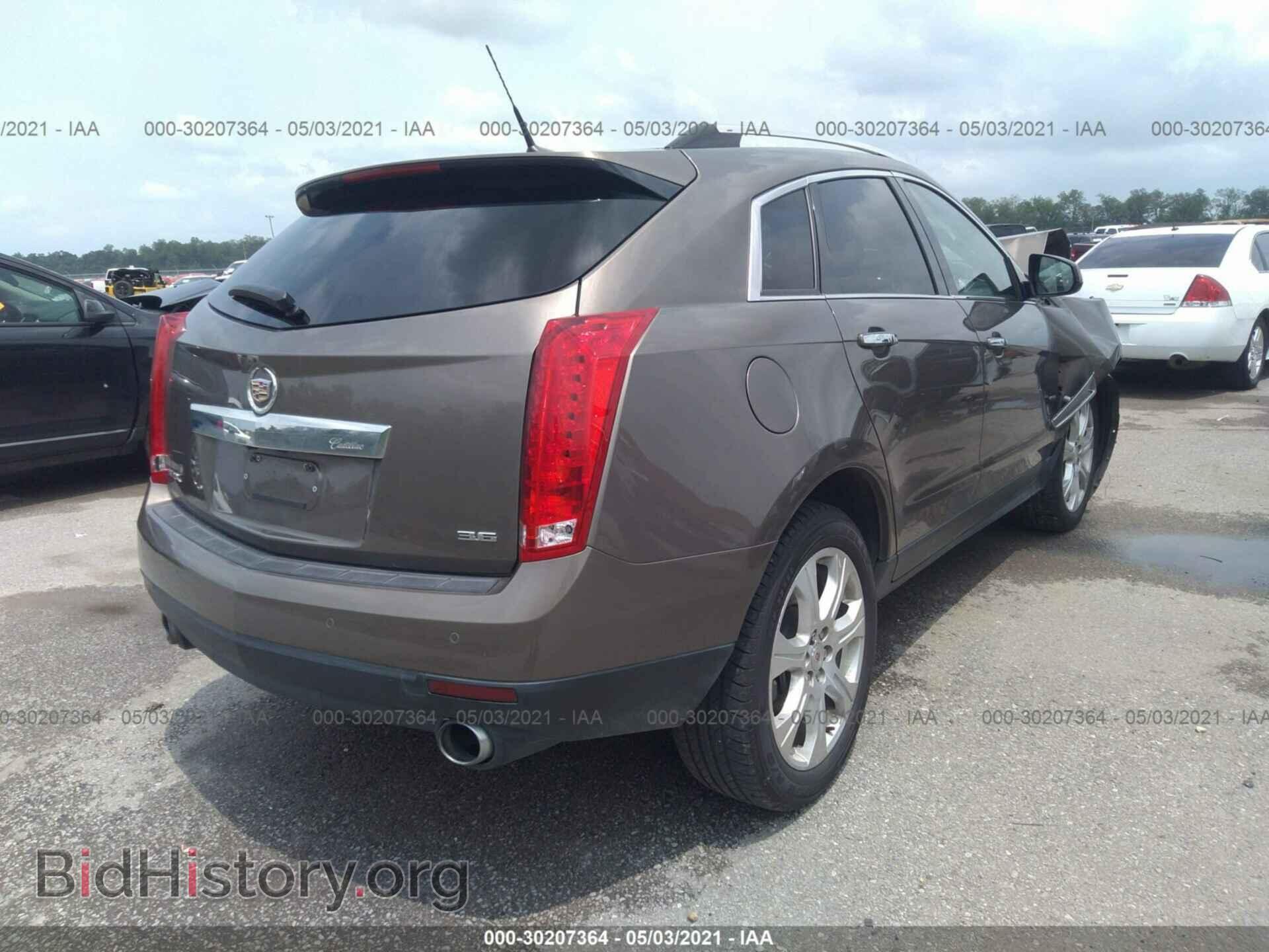 2014 CADILLAC SRX - VIN: 3GYFNDE3XES560804 - Фото 4