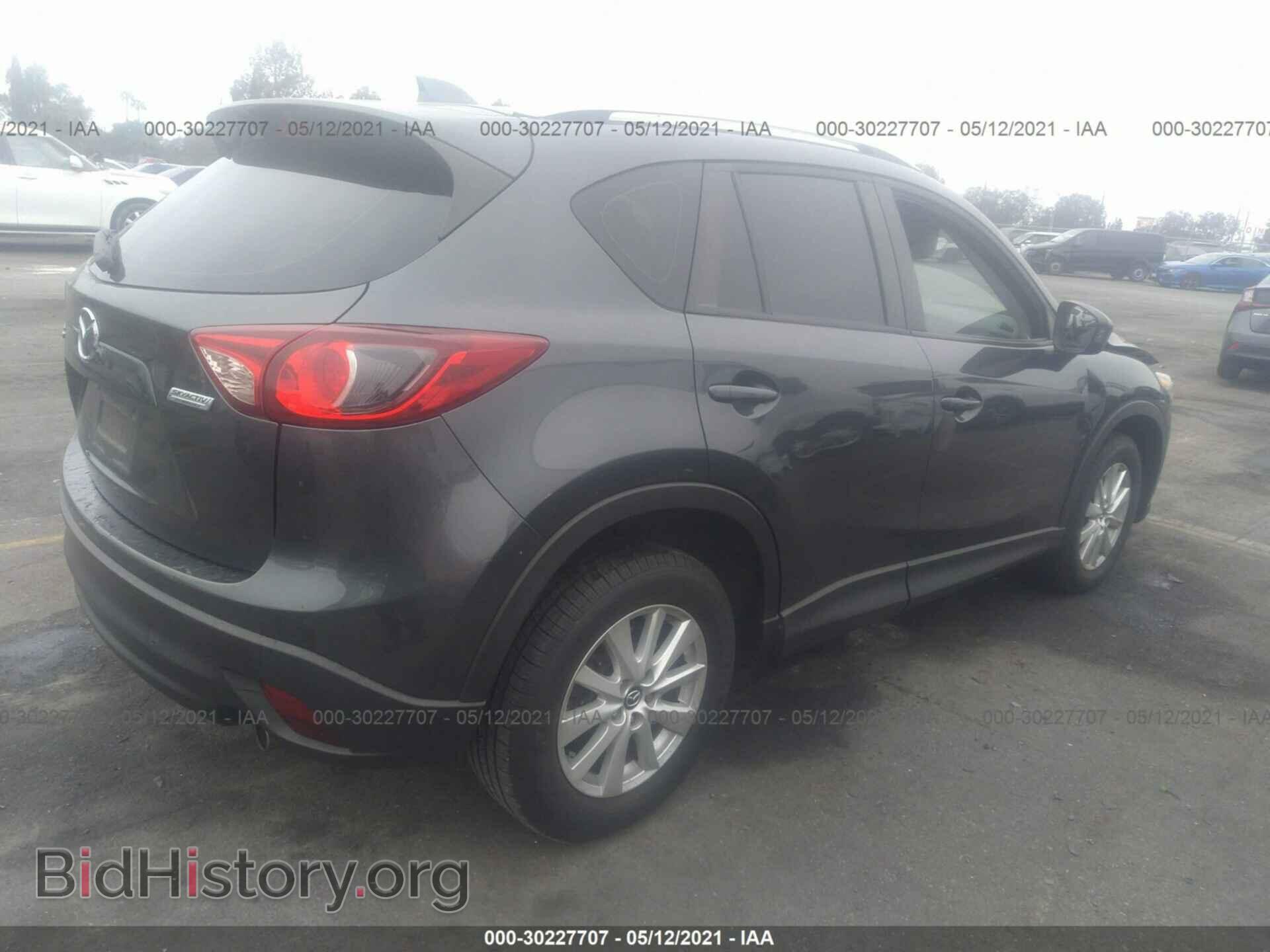 2014 MAZDA CX-5 - VIN: JM3KE2BEXE0376377 - Фото 4