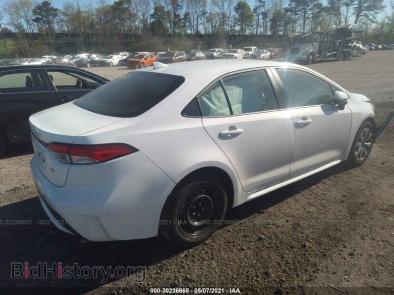 2021 Toyota COROLLA (VIN JTDEPMAE1MJ152601) — фото 4 из 12