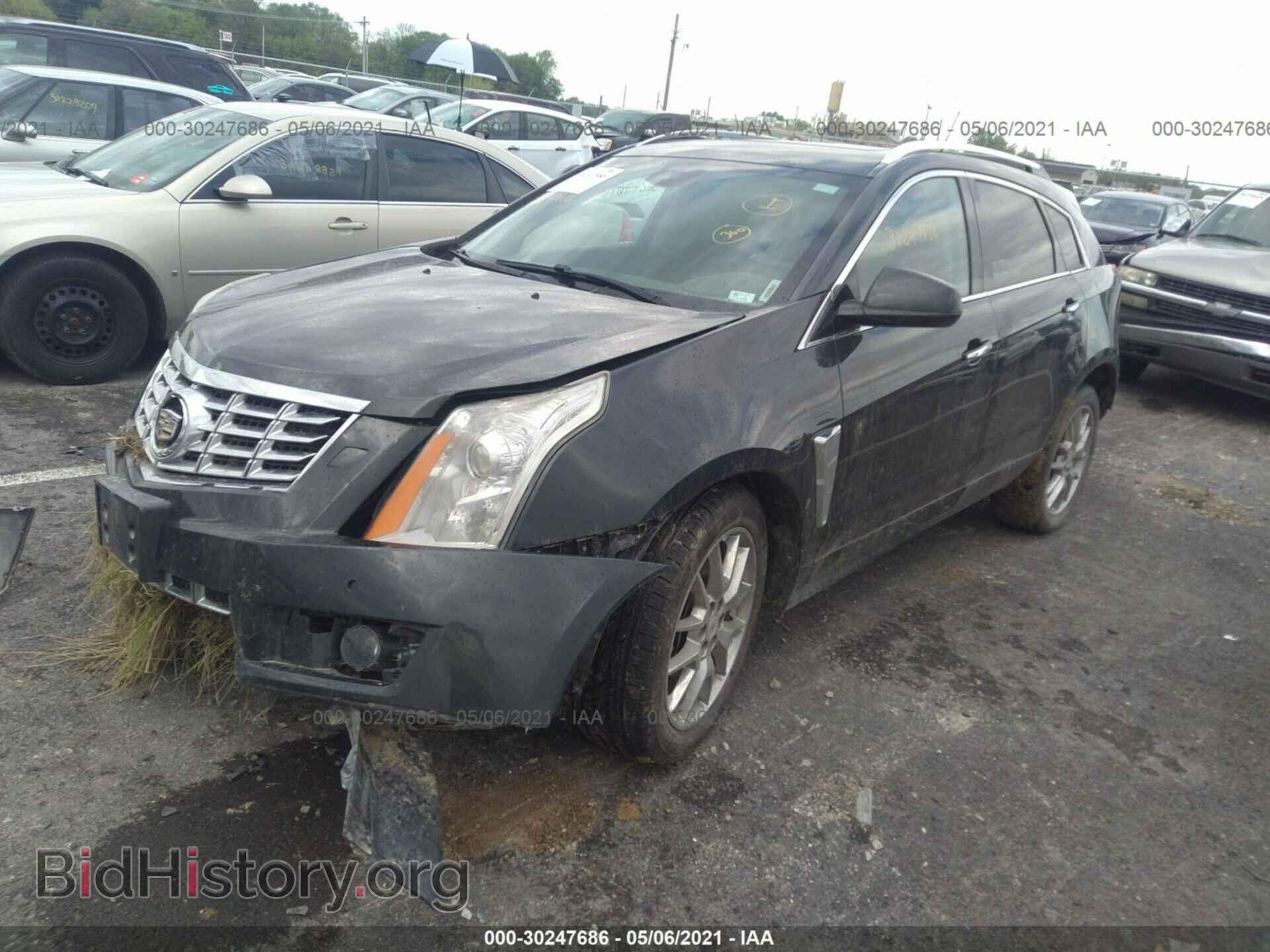2014 CADILLAC SRX - VIN: 3GYFNCE33ES676369 - Фото 2