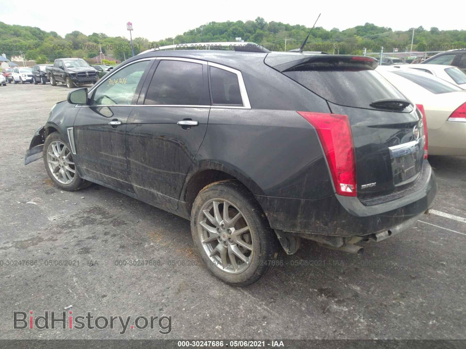 2014 CADILLAC SRX - VIN: 3GYFNCE33ES676369 - Фото 3