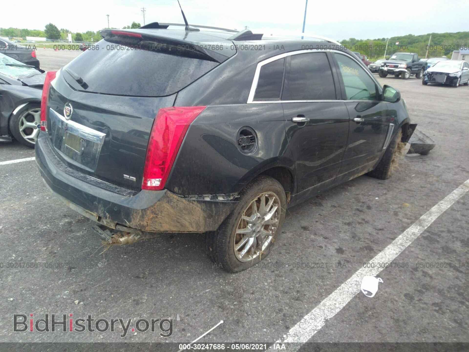 2014 CADILLAC SRX - VIN: 3GYFNCE33ES676369 - Фото 4