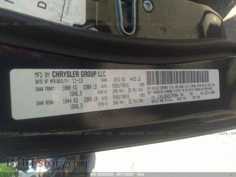 2014 Jeep COMPASS (VIN 1C4NJCBA2ED707904) — photo 9 of 11