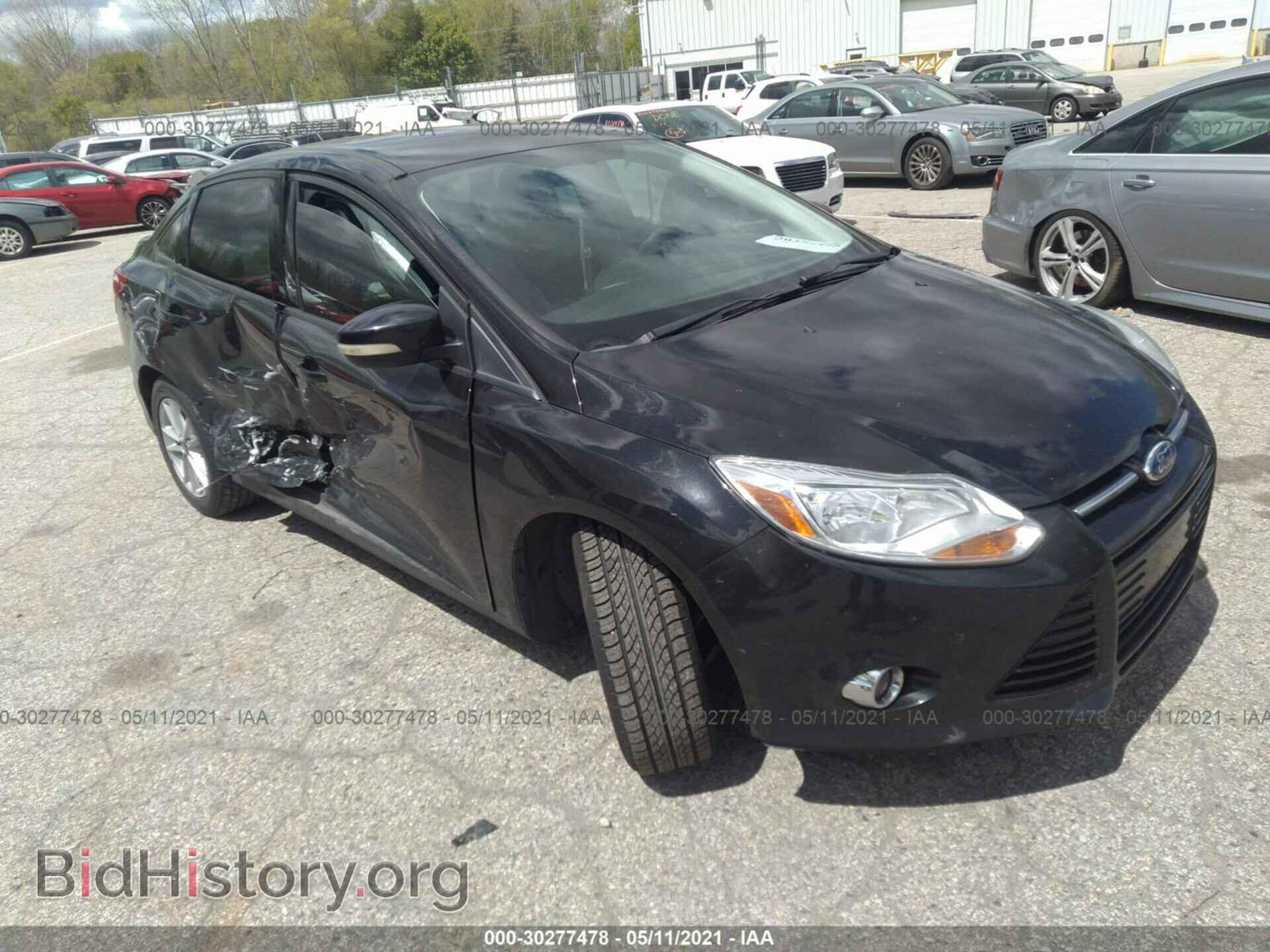 Фотография 1FAHP3F20CL329217 - FORD FOCUS 2012