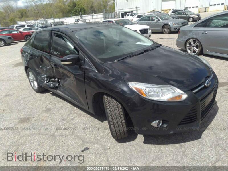 2012 Ford FOCUS SE (VIN 1FAHP3F20CL329217) — photo 1 of 11, IAAI, damage: right side