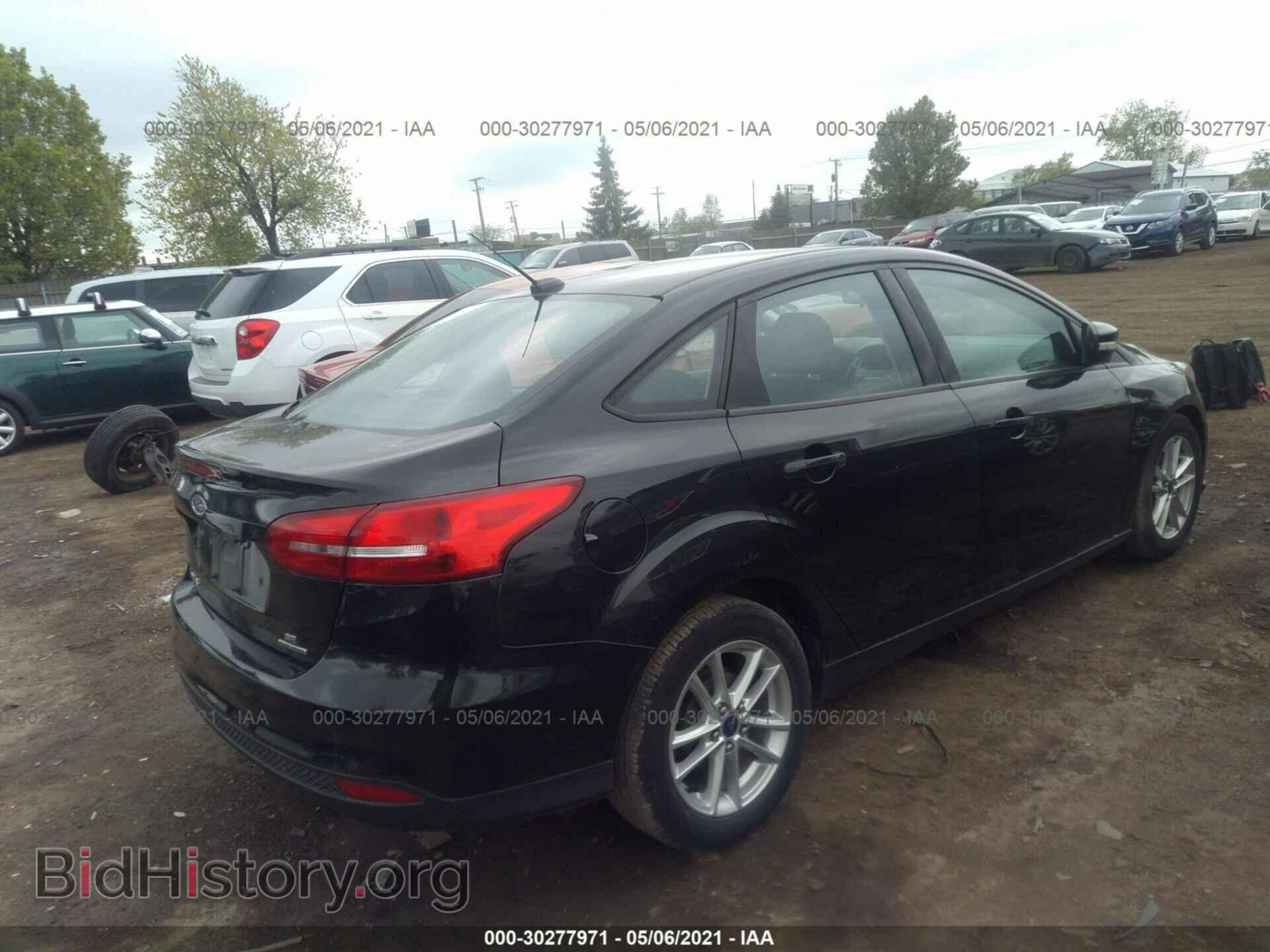 2015 FORD FOCUS - VIN: 1FADP3F25FL335209 - Photo 4