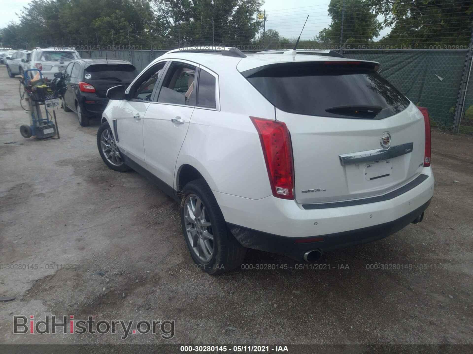 2014 CADILLAC SRX - VIN: 3GYFNGE3XES556835 - Фото 3