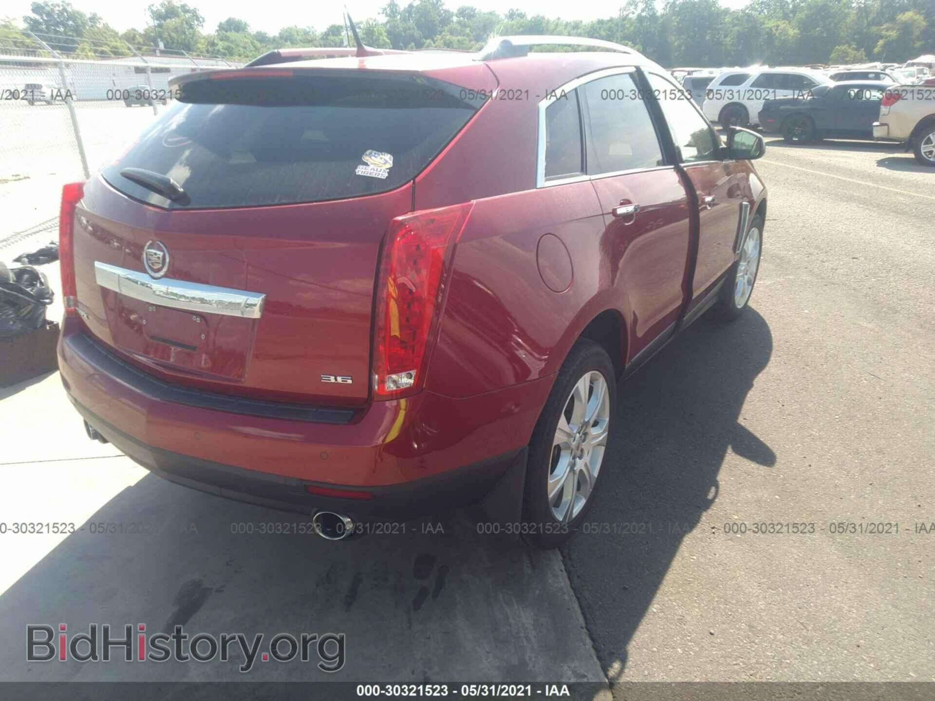 2014 CADILLAC SRX - VIN: 3GYFNCE30ES656757 - Фото 4