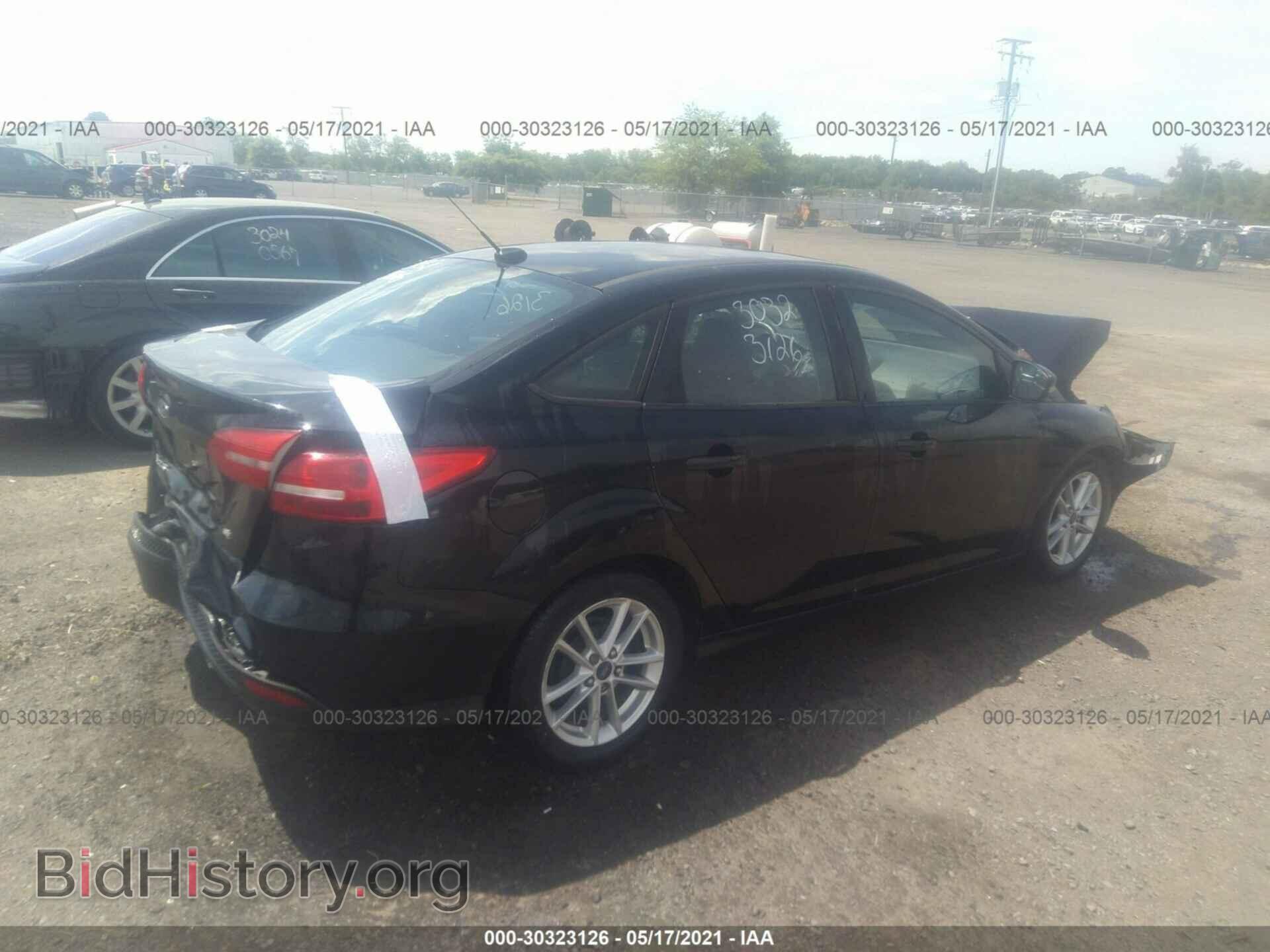 2016 FORD FOCUS - VIN: 1FADP3F26GL242362 - Photo 4