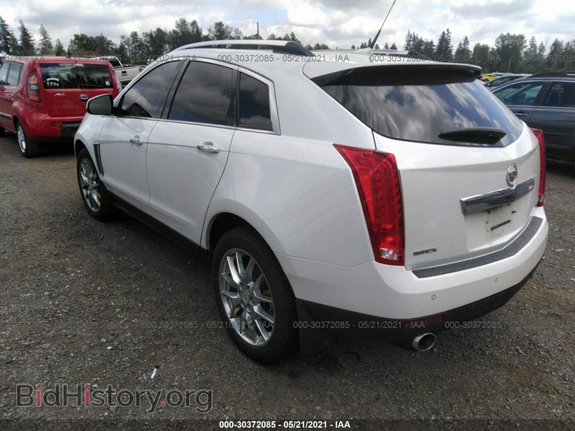 2014 CADILLAC SRX - VIN: 3GYFNCE3XES681973 - Фото 3