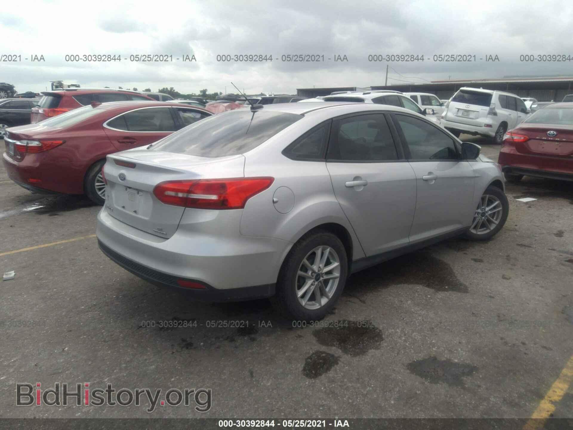 2016 FORD FOCUS - VIN: 1FADP3F21GL297219 - Photo 4