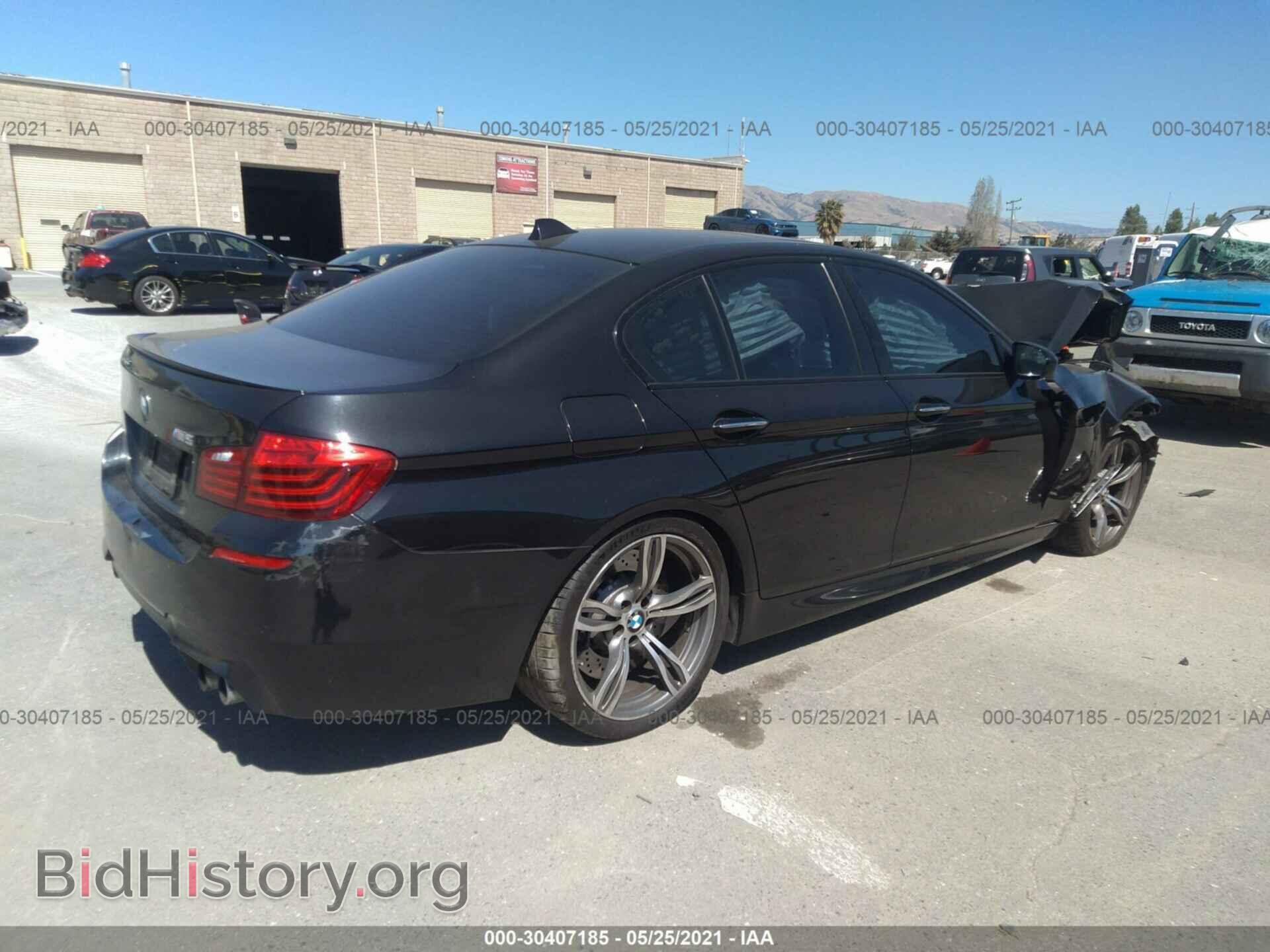 2014 BMW M5 - VIN: WBSFV9C51ED593089 - Фото 4