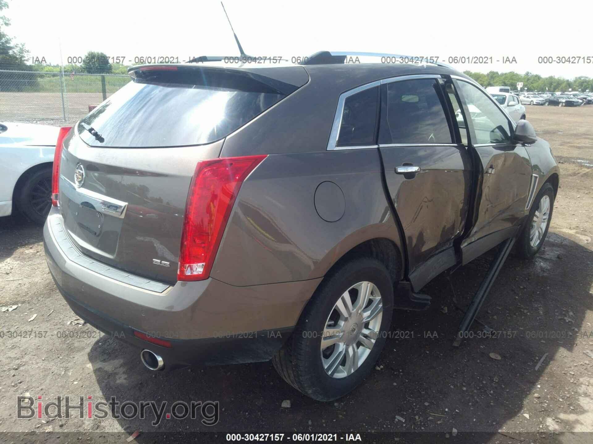 2014 CADILLAC SRX - VIN: 3GYFNBE34ES660983 - Фото 4