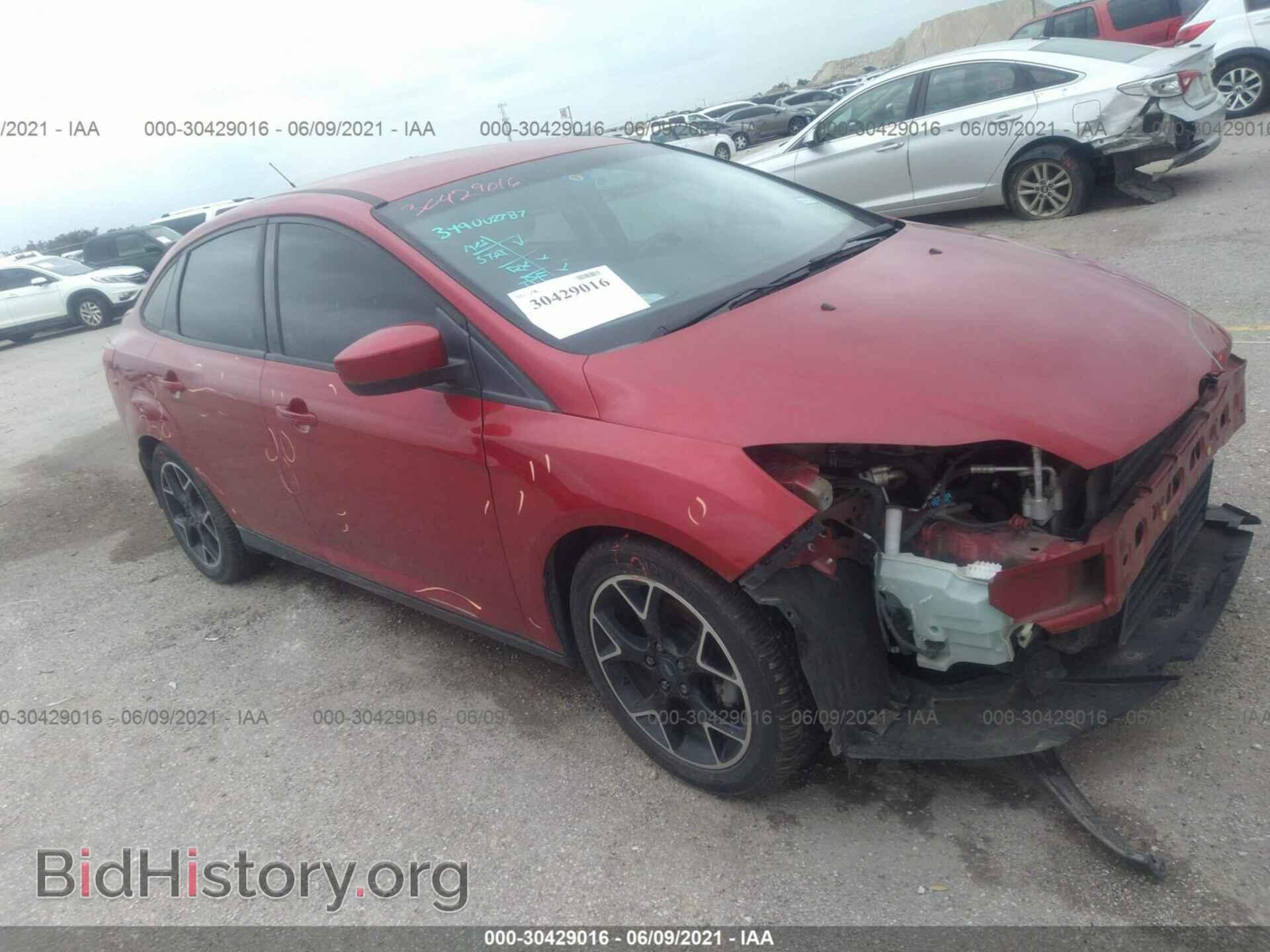 Фотография 1FAHP3F25CL324000 - FORD FOCUS 2012