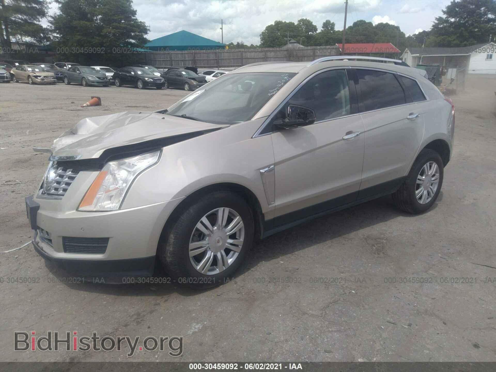 2014 CADILLAC SRX - VIN: 3GYFNEE32ES566635 - Фото 2