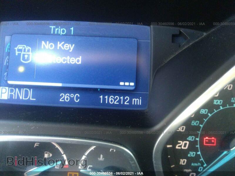 2012 Ford FOCUS (VIN 1FAHP3F28CL105113) — photo 7 of 11