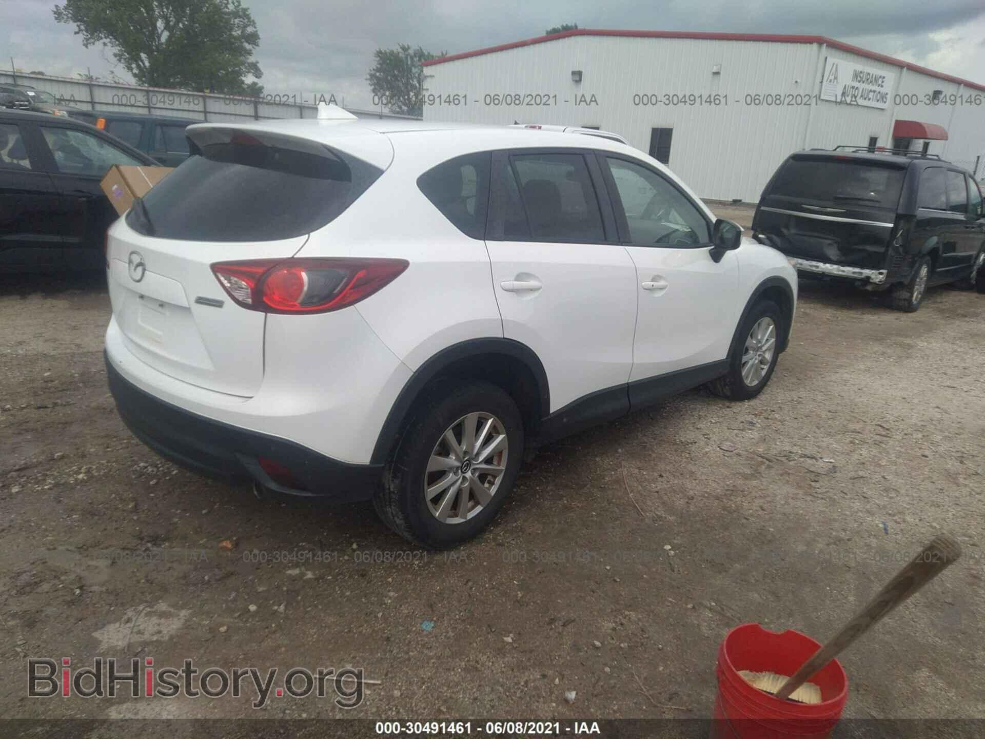 2016 MAZDA CX-5 - VIN: JM3KE2CY8G0633970 - Фото 4