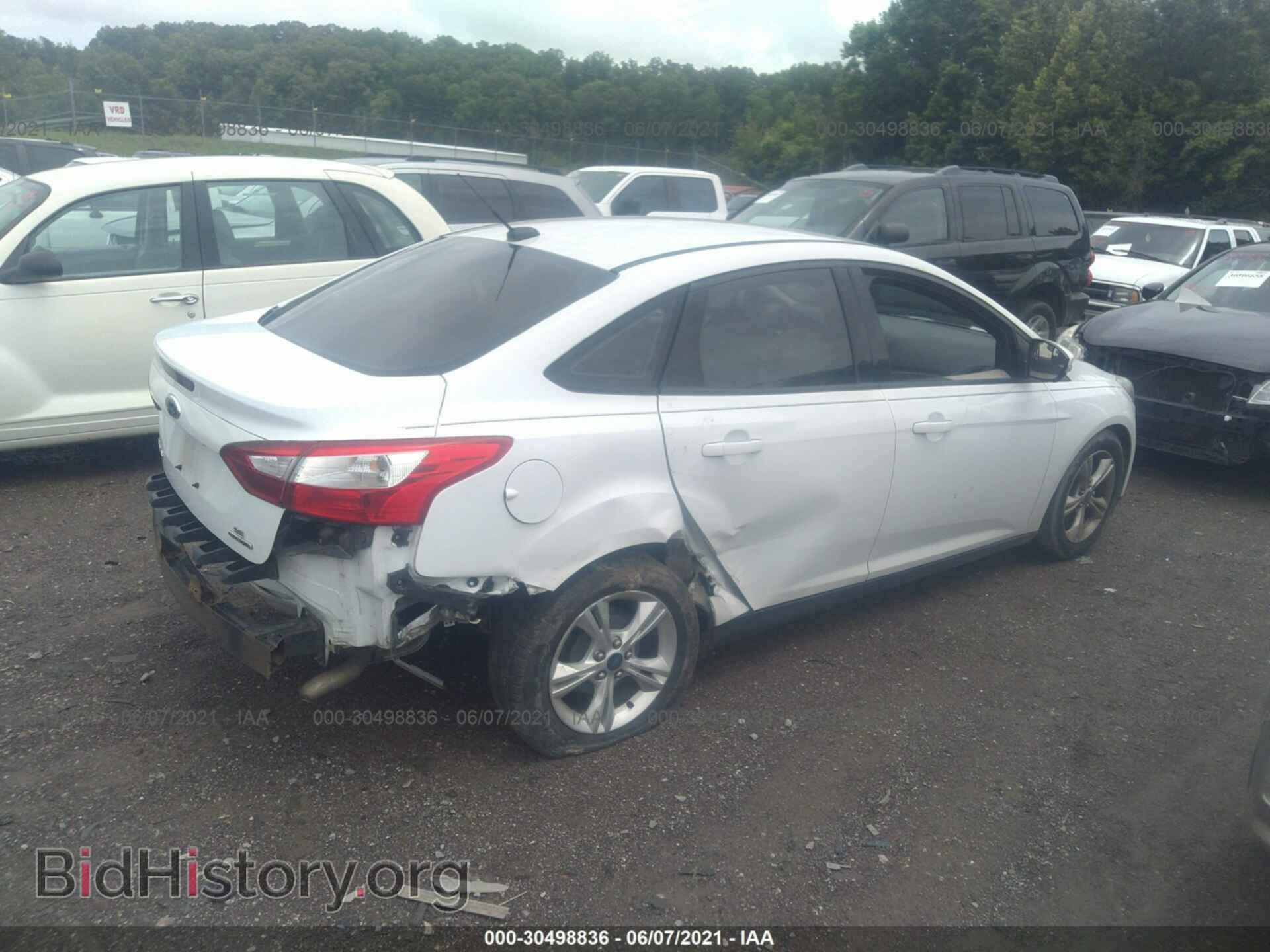 2014 FORD FOCUS - VIN: 1FADP3F20EL216000 - Photo 4
