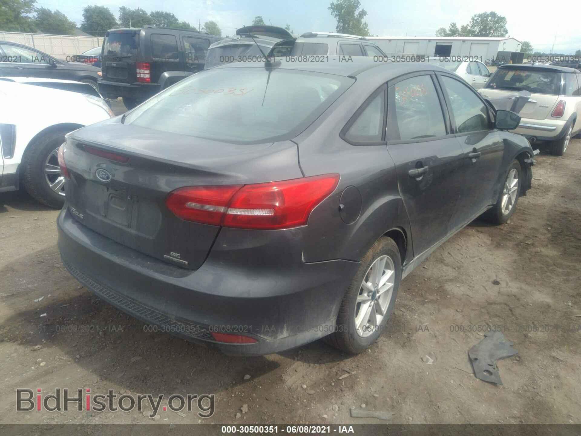 2015 FORD FOCUS - VIN: 1FADP3F29FL334922 - Photo 4