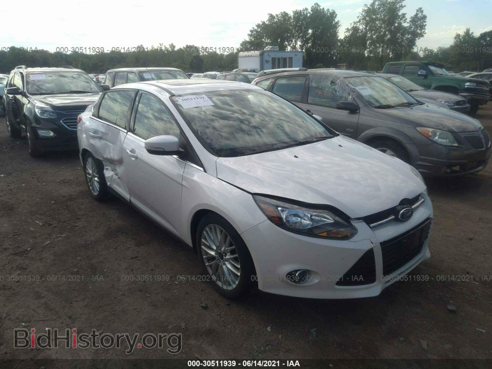 Фотография 1FADP3J28EL106190 - FORD FOCUS 2014