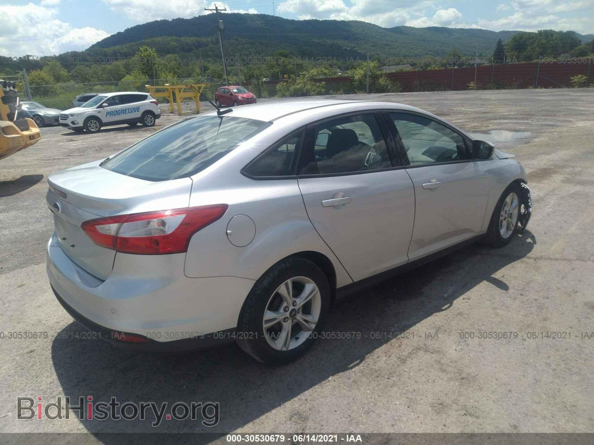 2014 FORD FOCUS - VIN: 1FADP3F2XEL309977 - Photo 4