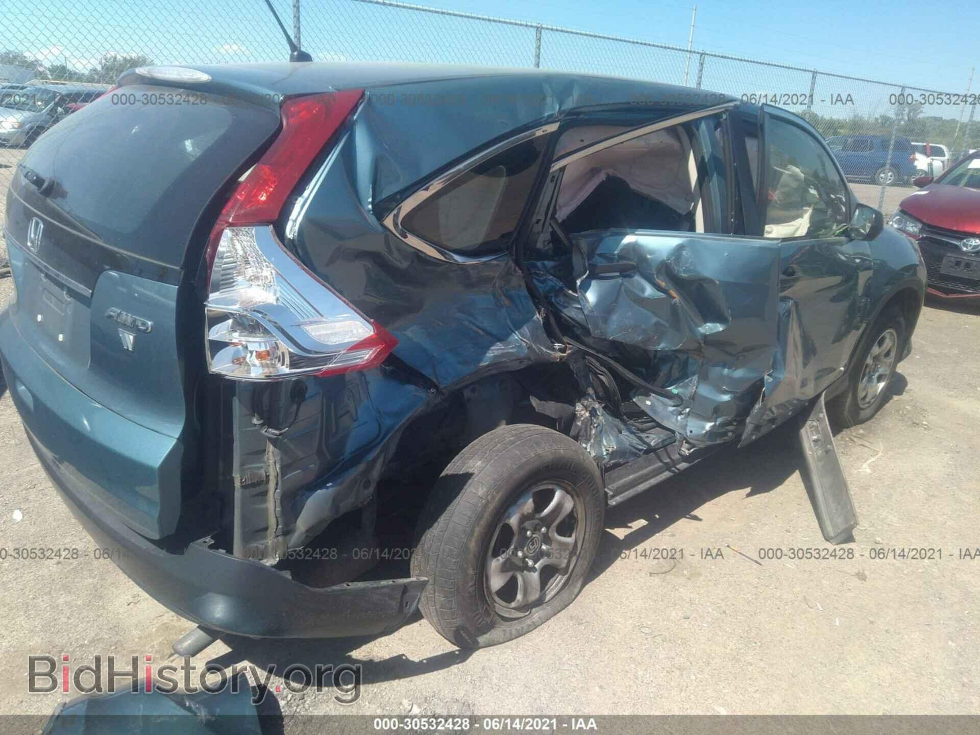2014 HONDA CR-V - VIN: 5J6RM4H35EL091607 - Фото 4