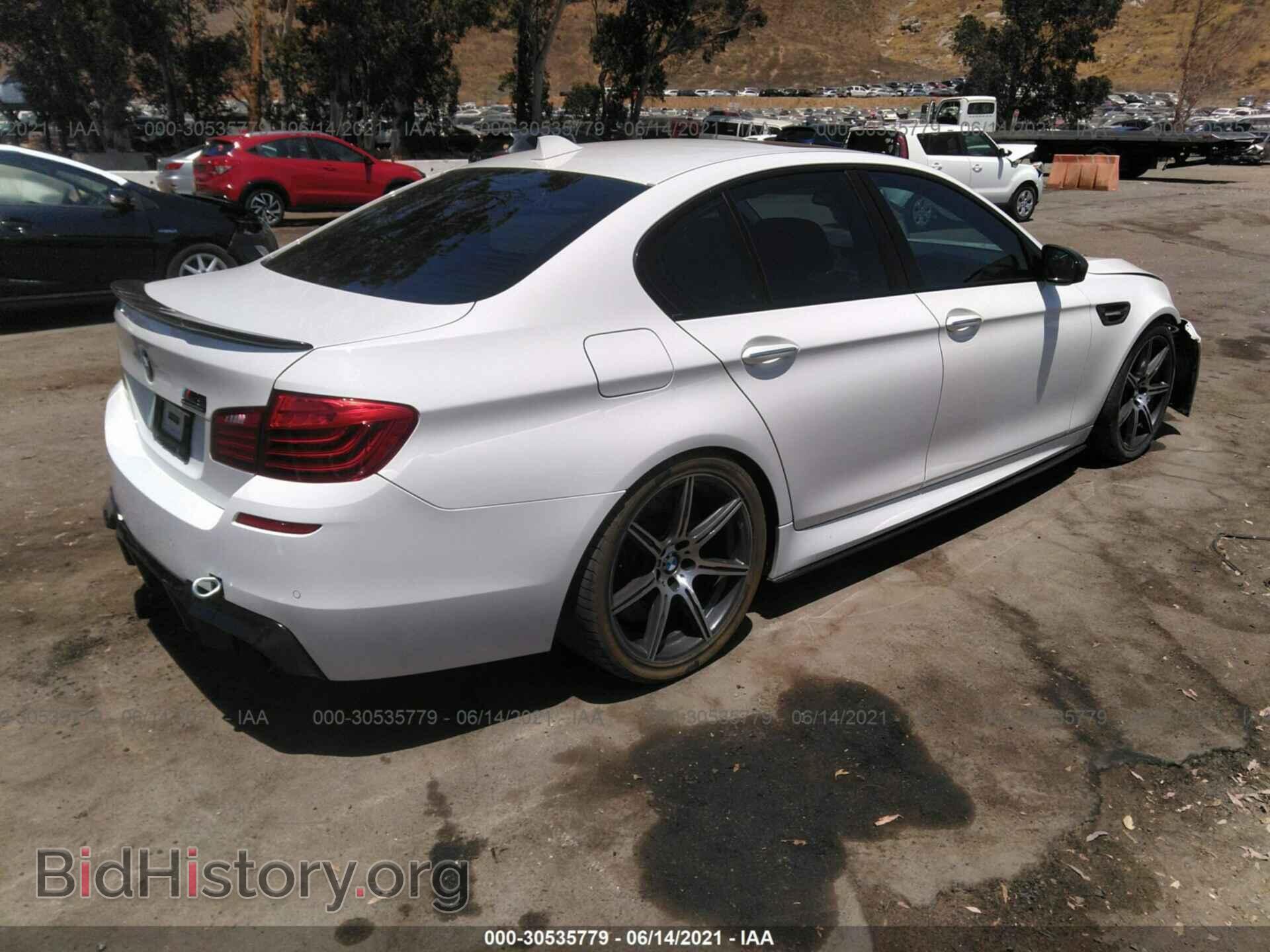 2014 BMW M5 - VIN: WBSFV9C5XED097403 - Photo 4