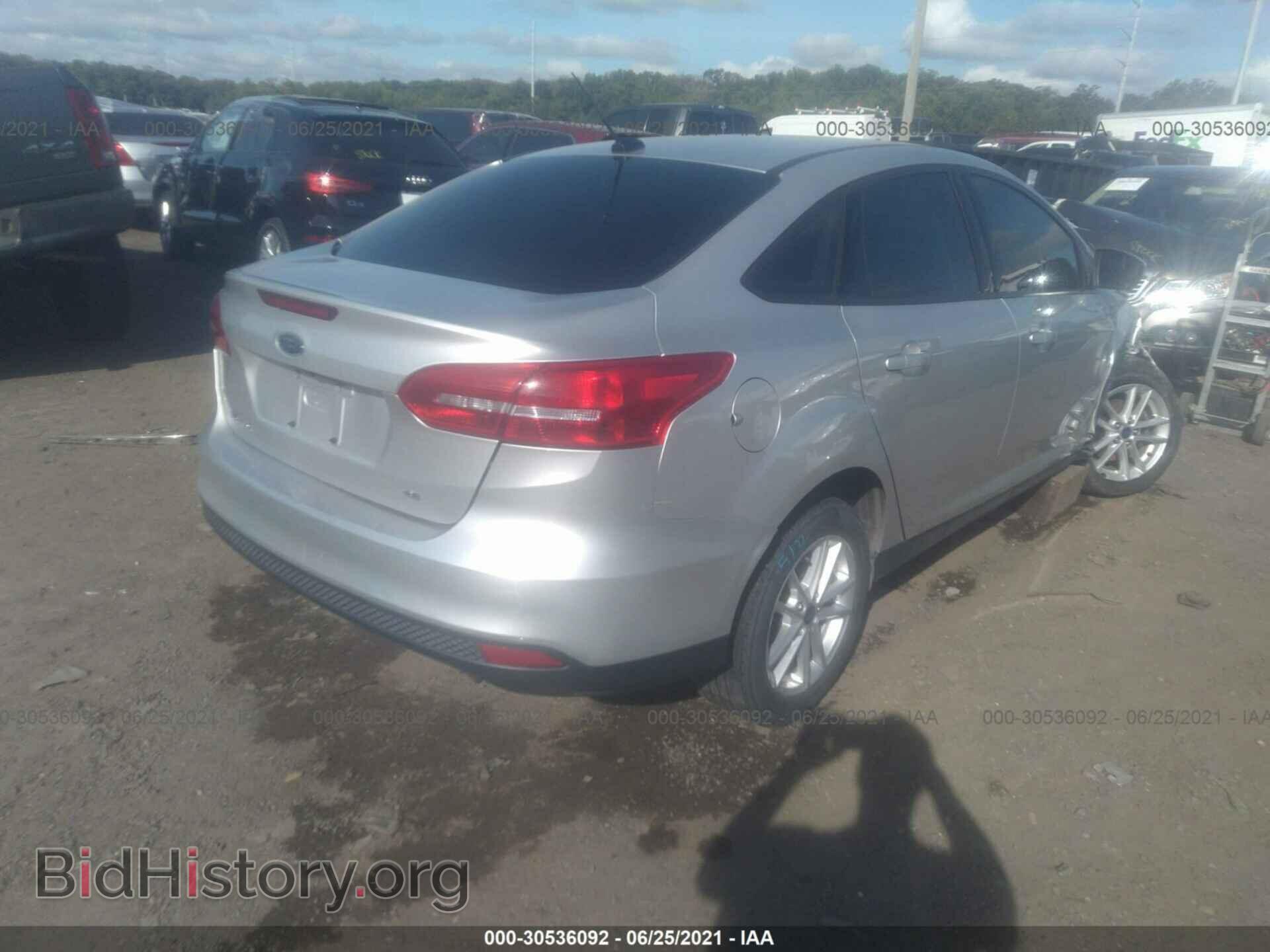 2016 FORD FOCUS - VIN: 1FADP3F22GL338652 - Photo 4