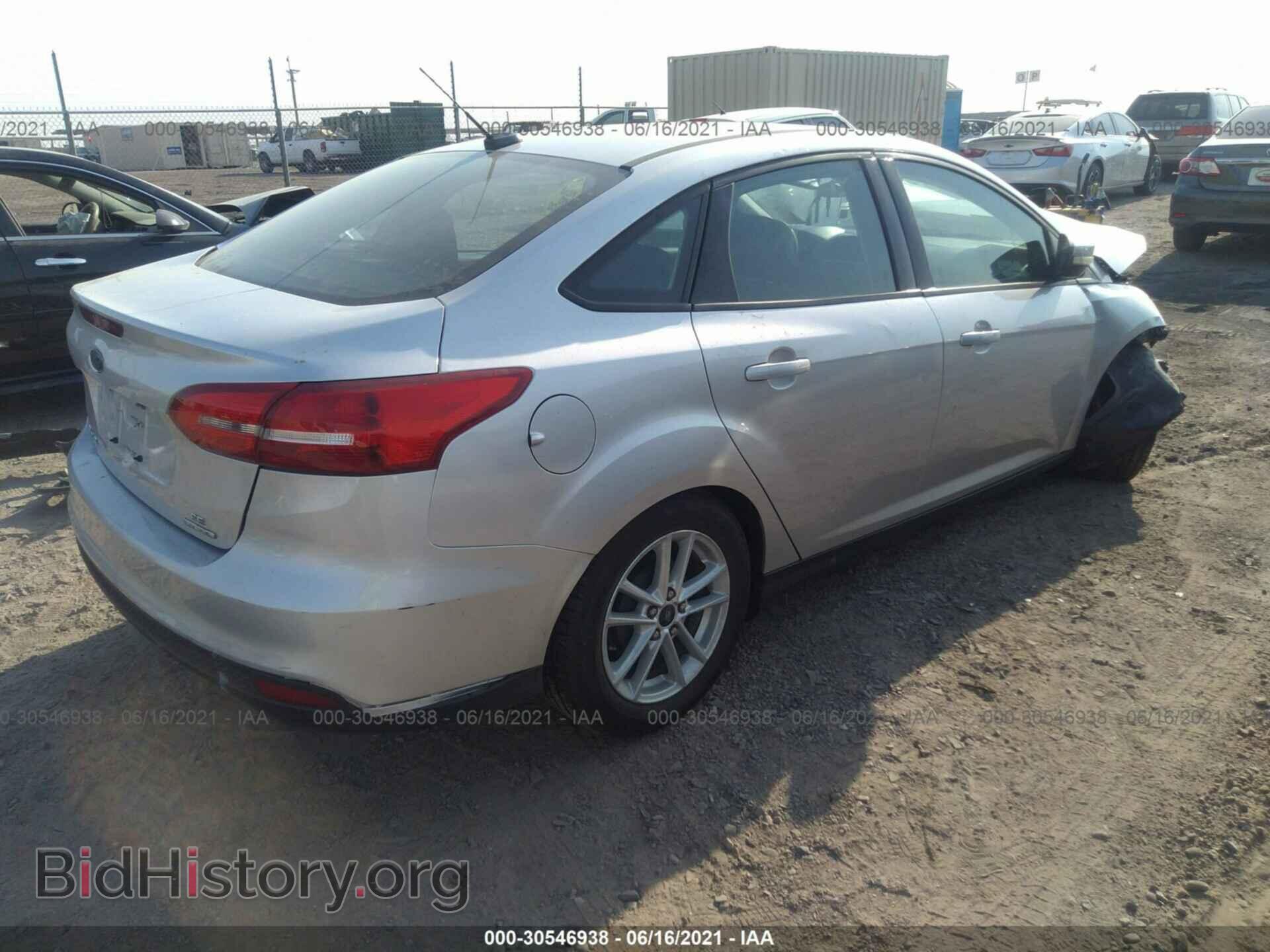 2015 FORD FOCUS - VIN: 1FADP3F22FL202424 - Photo 4