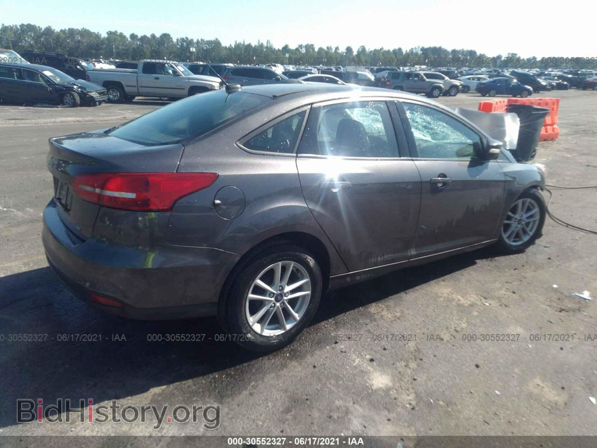 2016 FORD FOCUS - VIN: 1FADP3F24GL211109 - Photo 4