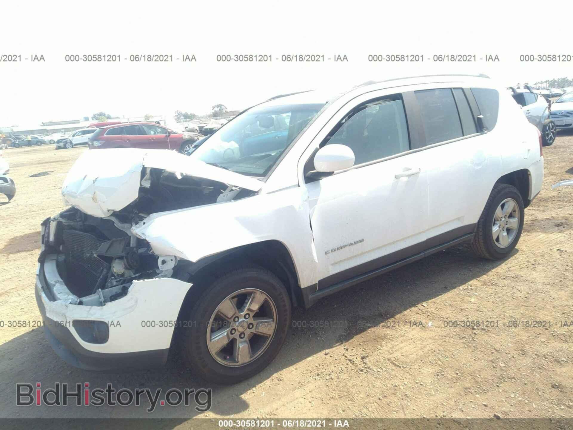 2014 JEEP COMPASS - VIN: 1C4NJCEA7ED606594 - Photo 2