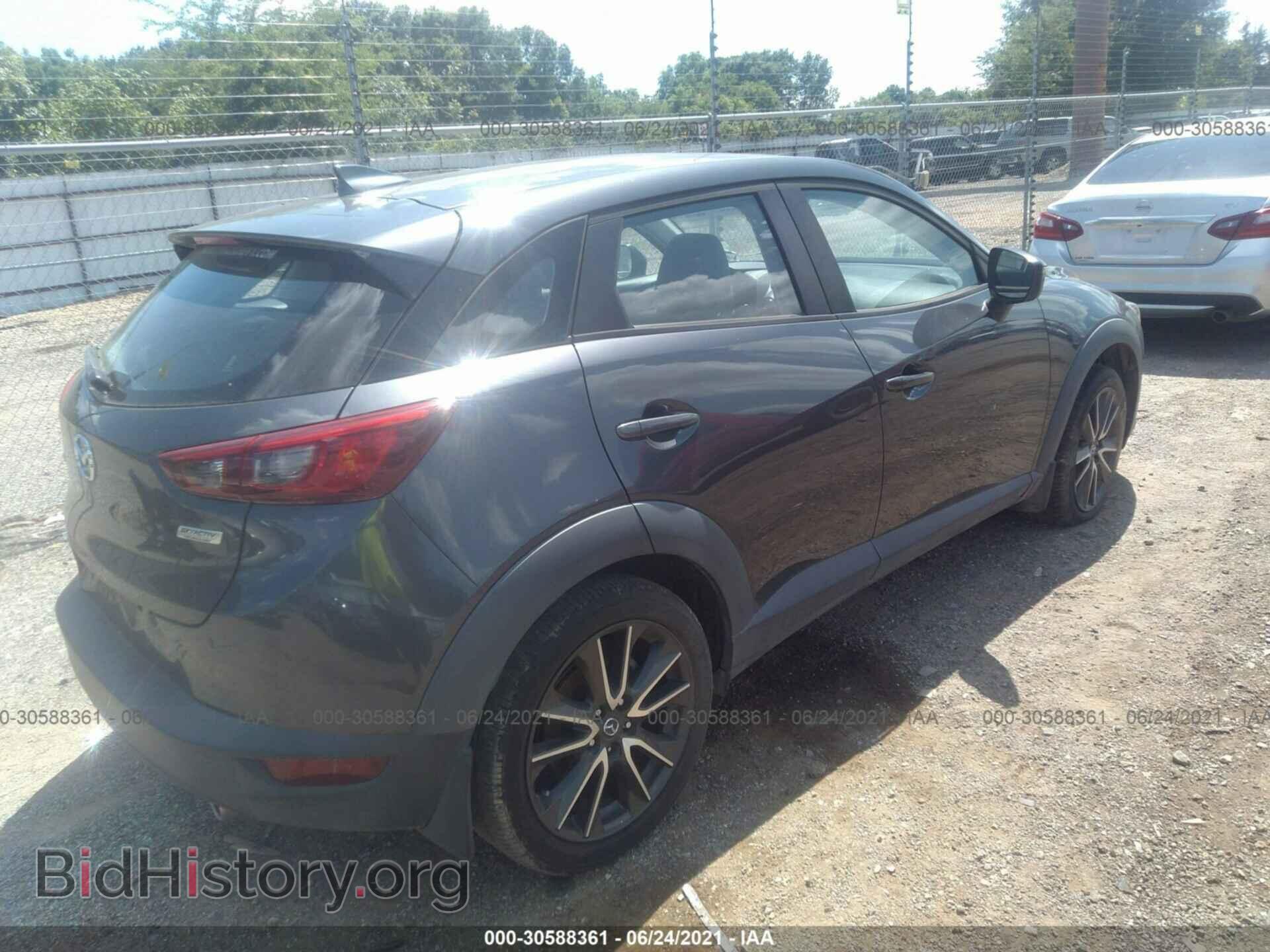2017 MAZDA CX-3 - VIN: JM1DKDC77H0141803 - Фото 4