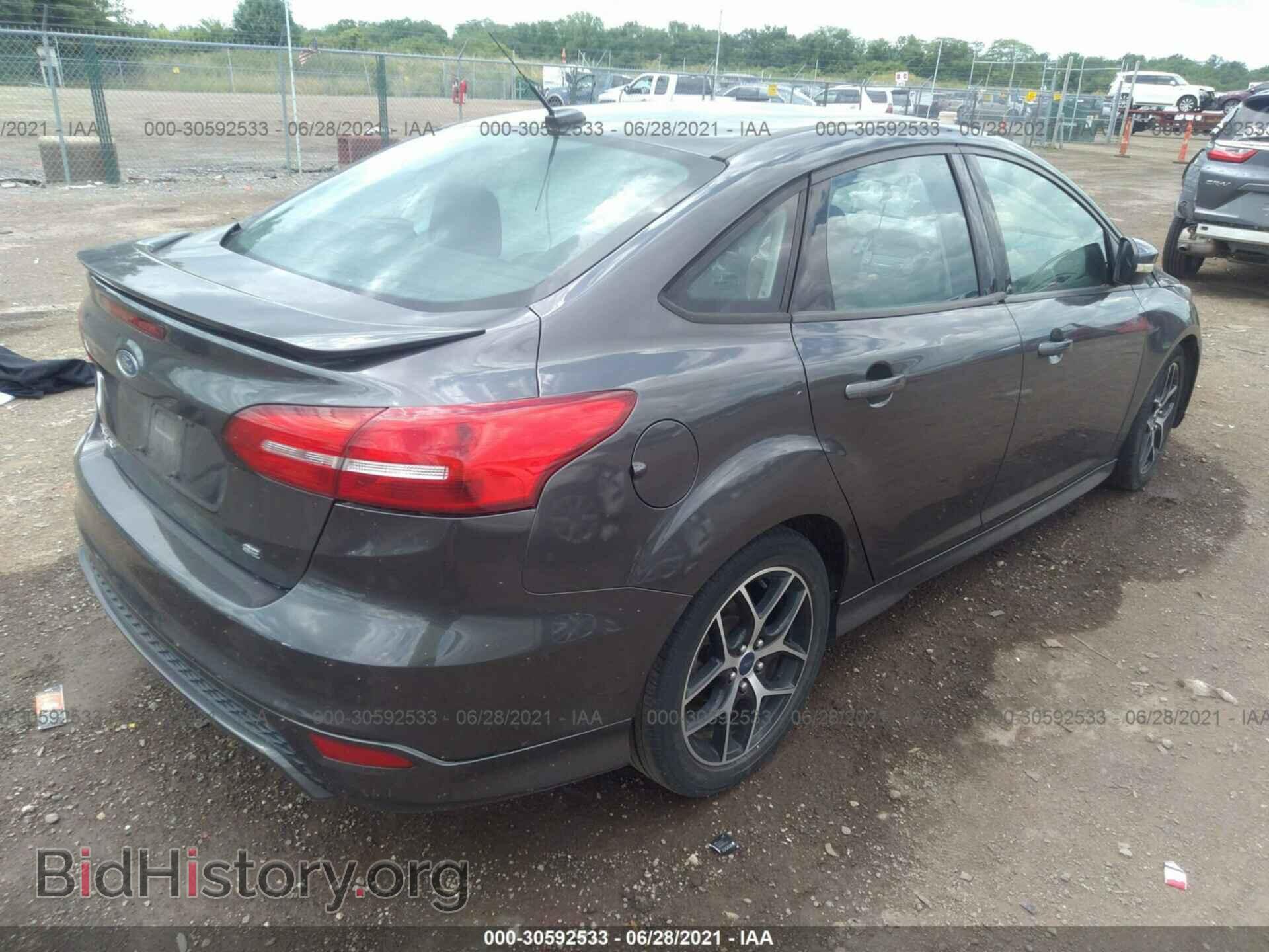 2015 FORD FOCUS - VIN: 1FADP3F25FL260348 - Photo 4