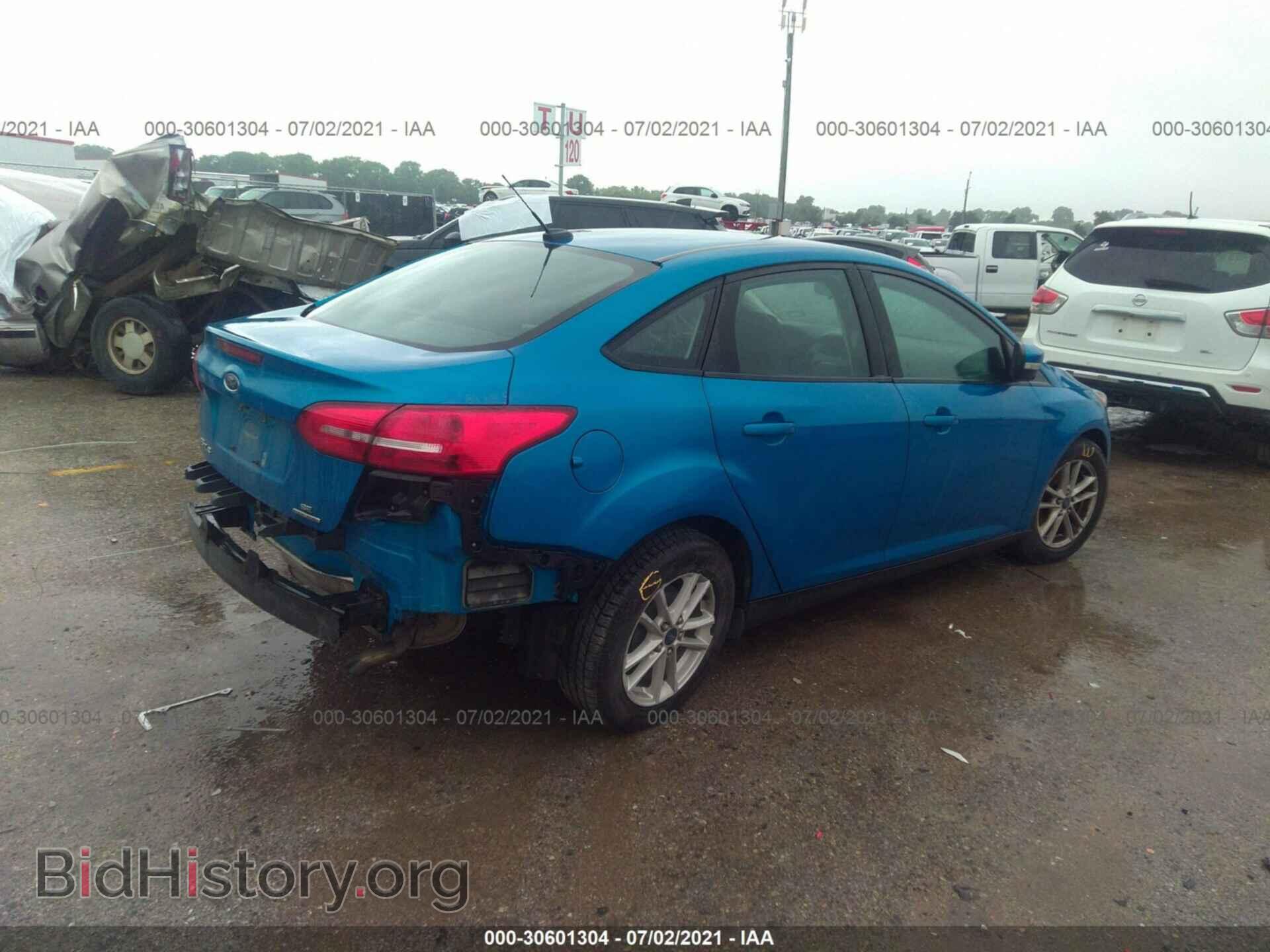 2015 FORD FOCUS - VIN: 1FADP3F20FL340379 - Photo 4