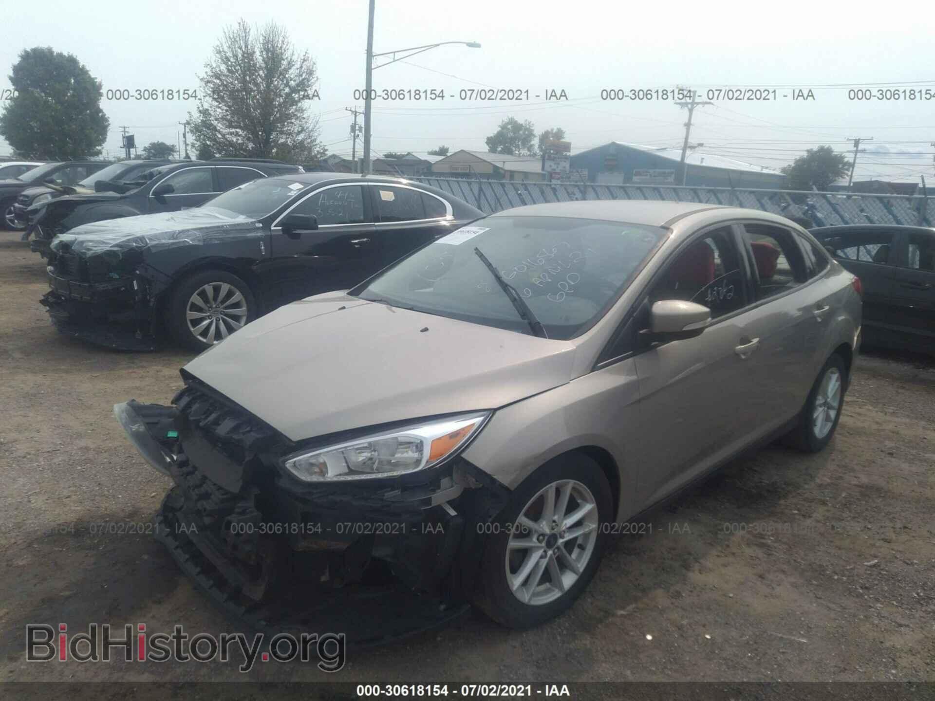 2016 FORD FOCUS - VIN: 1FADP3F22GL403600 - Фото 2