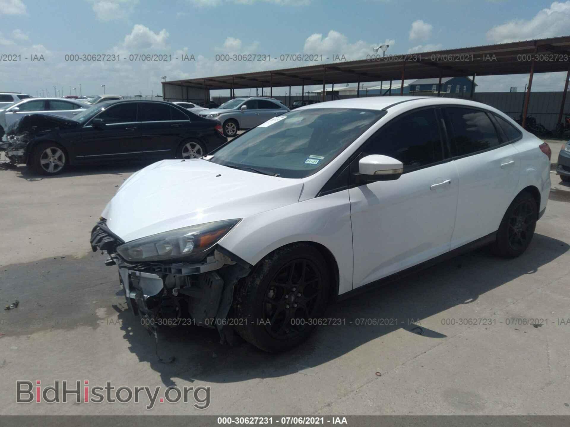 2016 FORD FOCUS - VIN: 1FADP3F20GL291573 - Фото 2