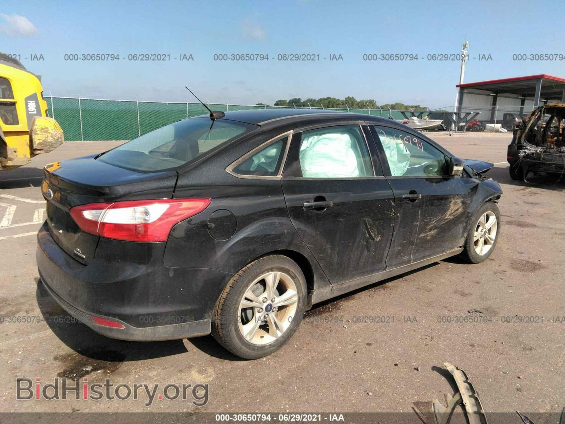 2014 FORD FOCUS - VIN: 1FADP3F2XEL169428 - Photo 4