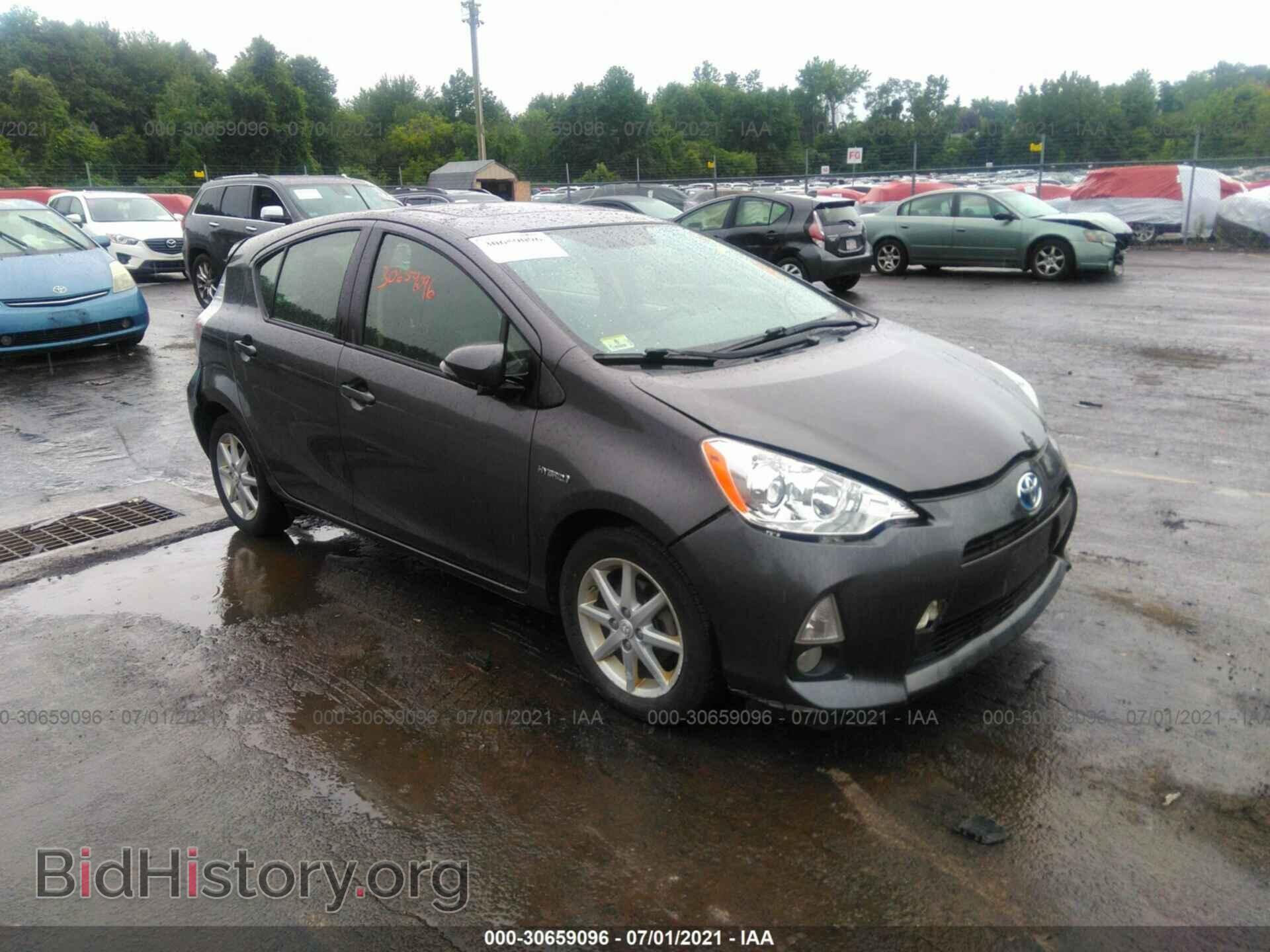 Фотография JTDKDTB37E1075432 - TOYOTA PRIUS C 2014