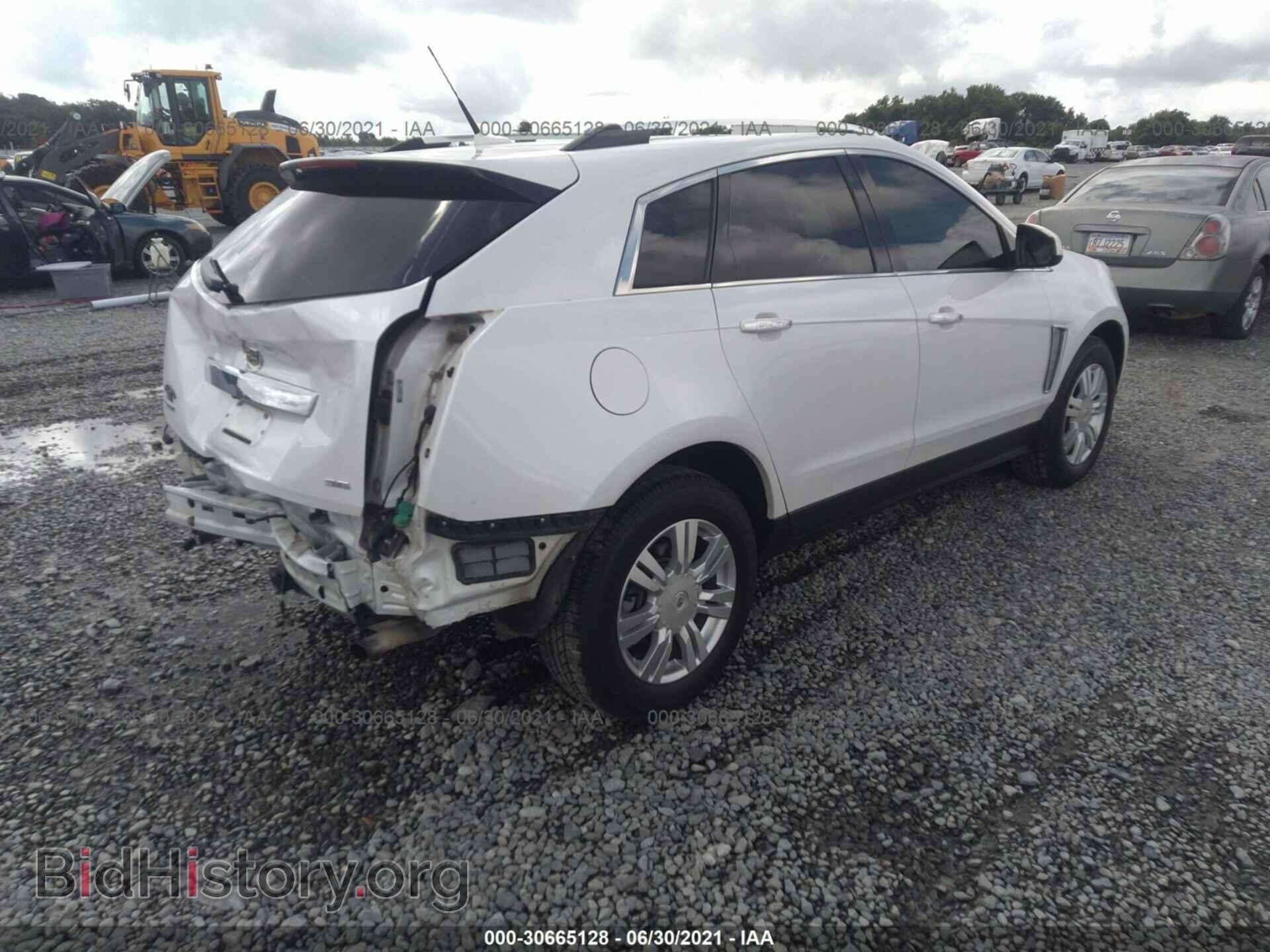 2013 CADILLAC SRX - VIN: 3GYFNCE38DS530872 - Фото 4