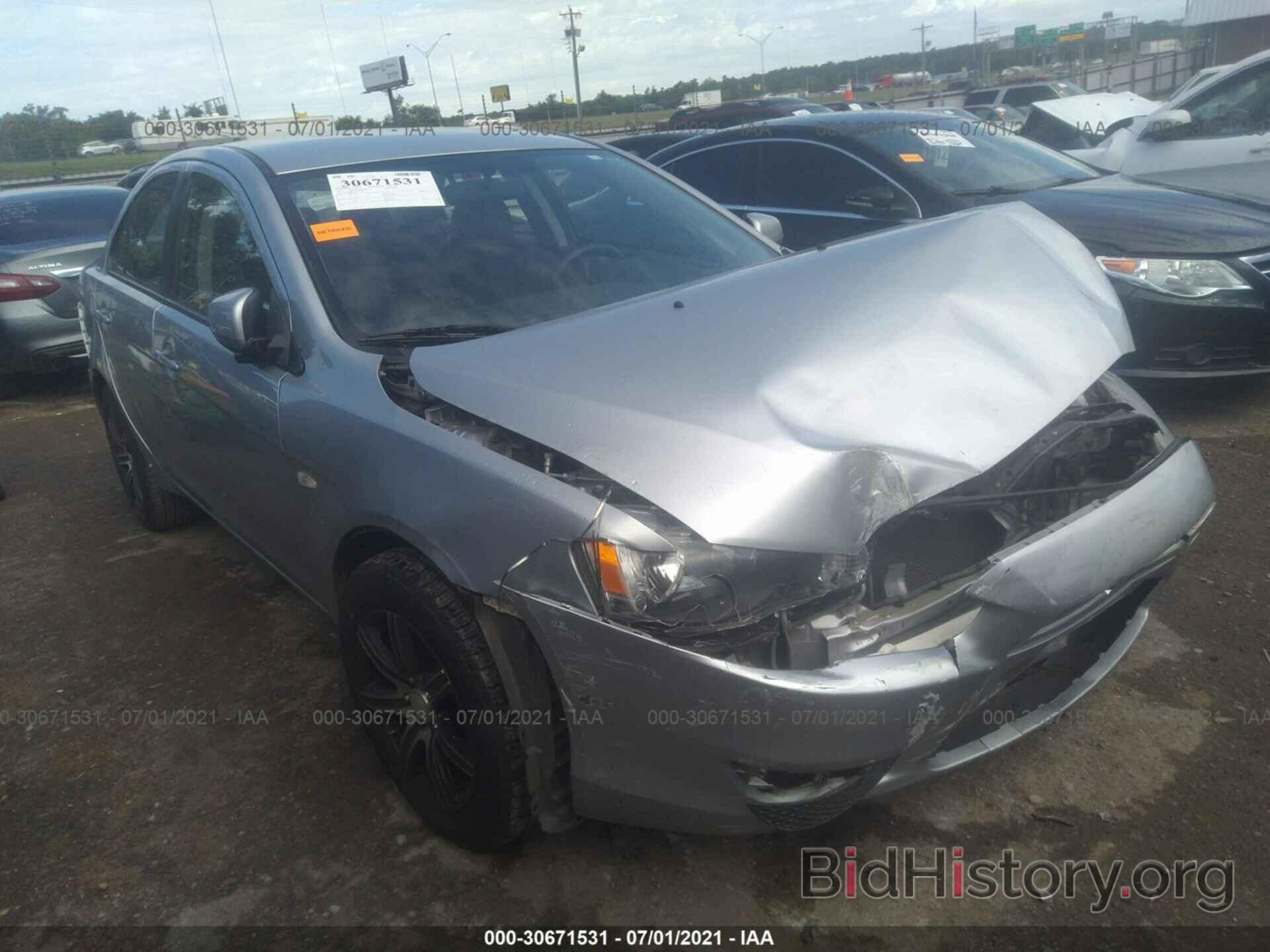 Photo JA32U2FU1DU002565 - MITSUBISHI LANCER 2013