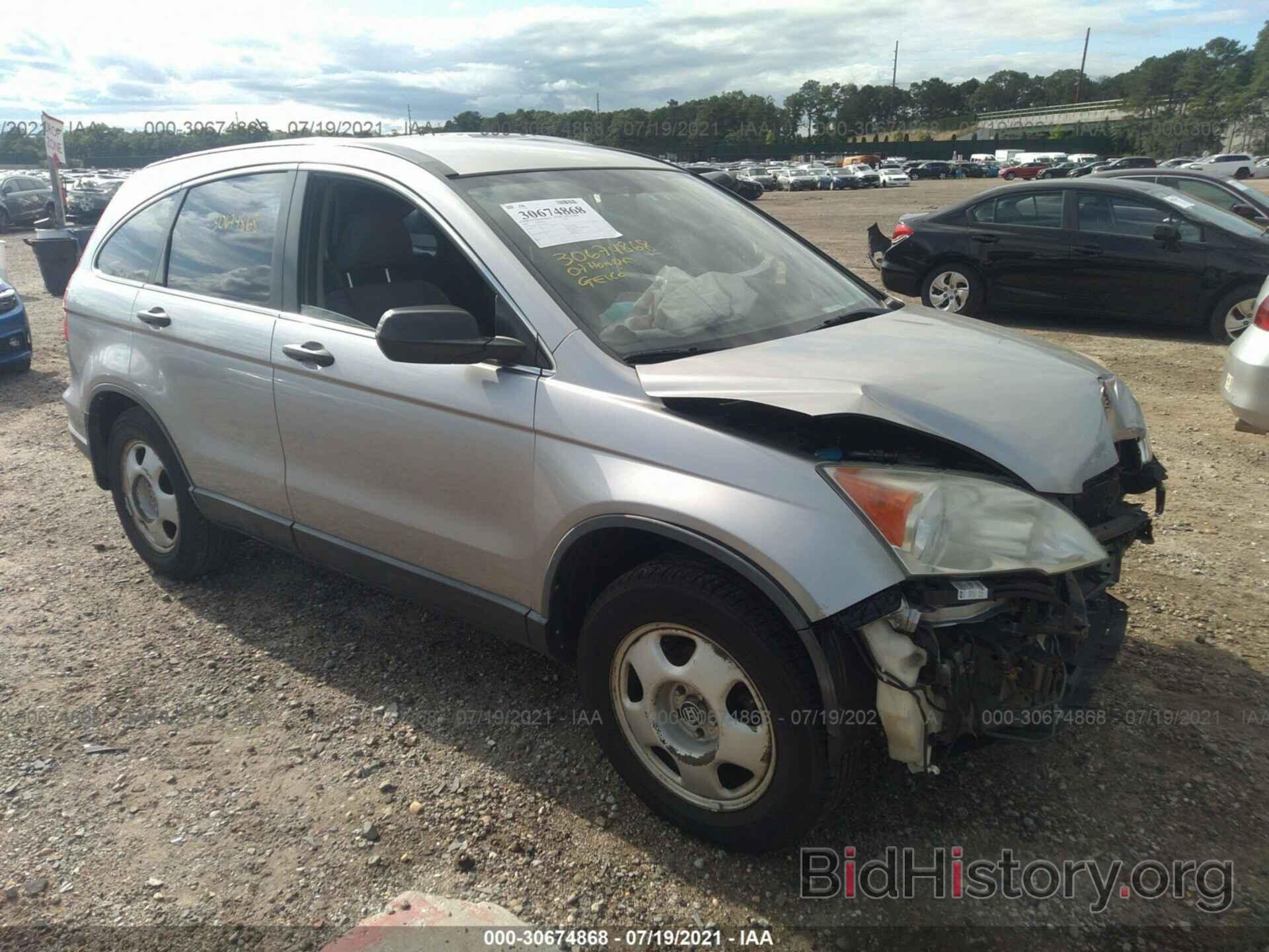 Photo JHLRE48327C029090 - HONDA CR-V 2007