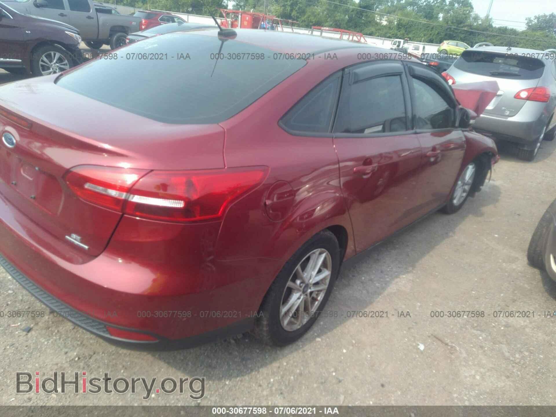 2016 FORD FOCUS - VIN: 1FADP3F21GL358648 - Photo 4