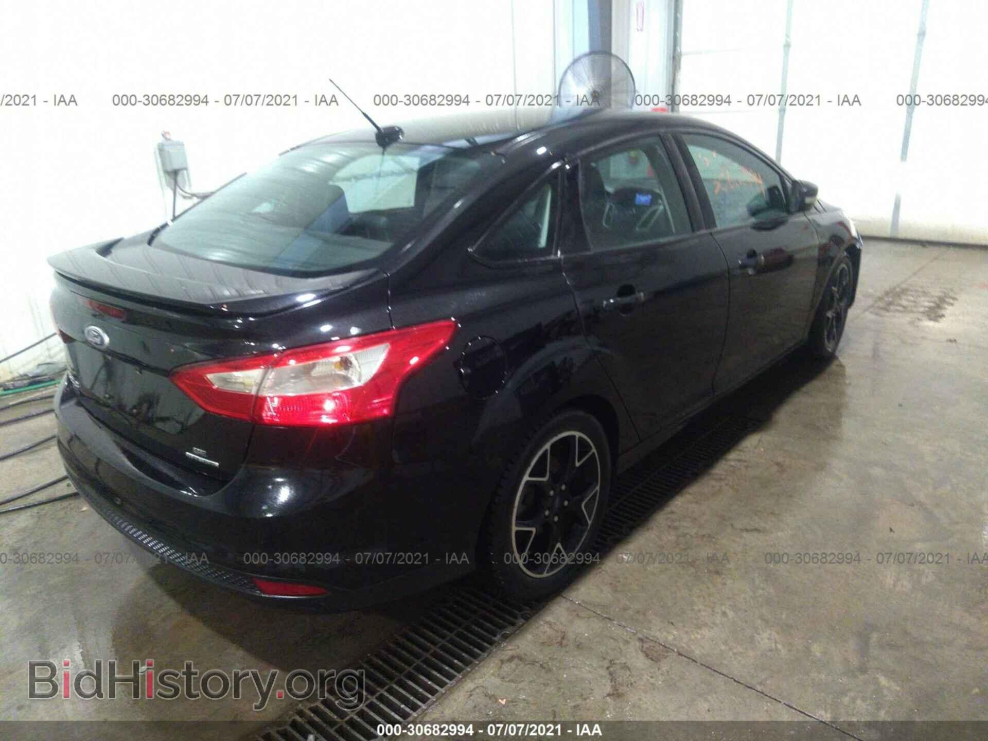 2014 FORD FOCUS - VIN: 1FADP3F22EL407384 - Photo 4