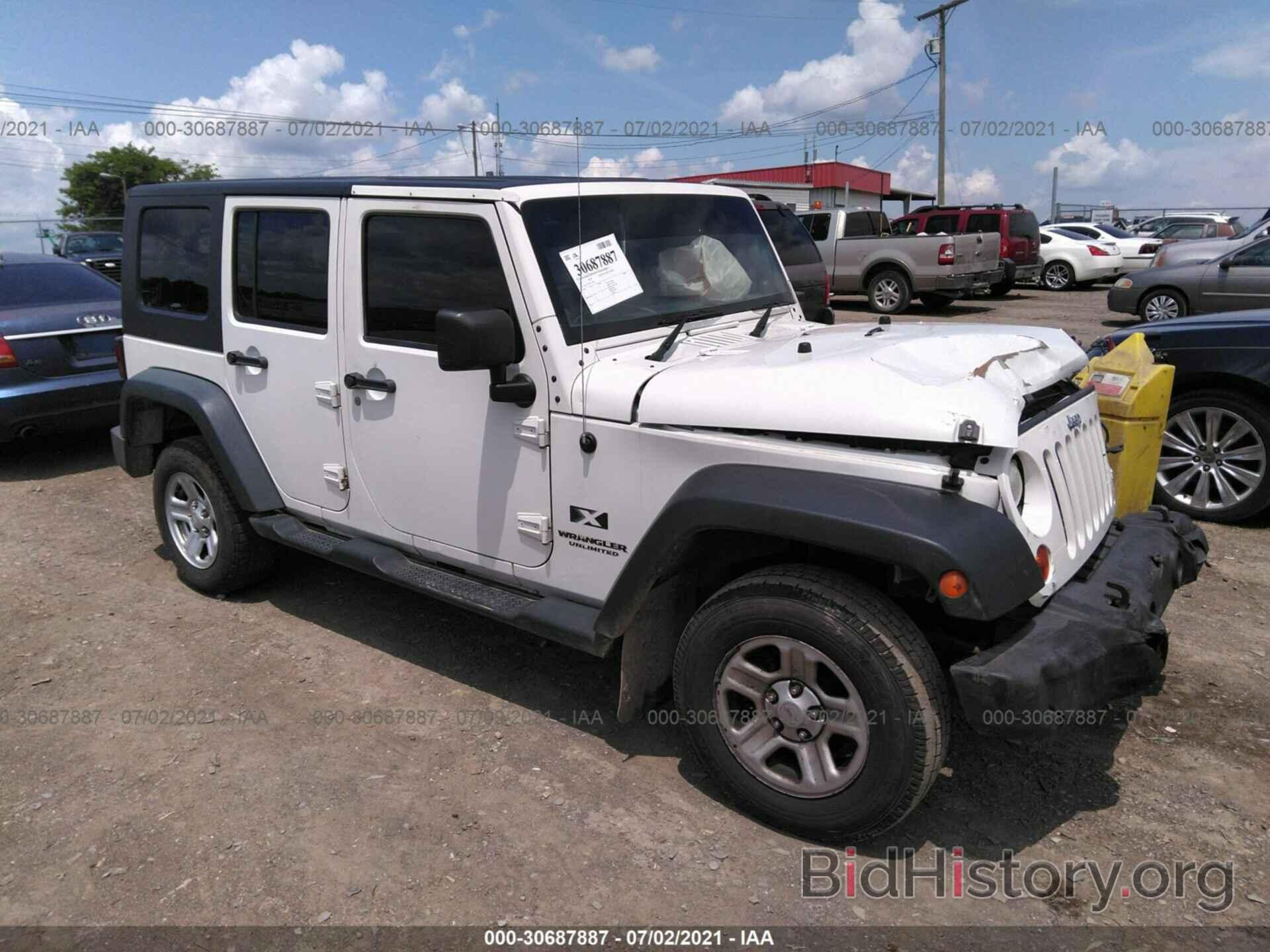 Photo 1J4GZ39199L710585 - JEEP WRANGLER UNLIMITED 2009